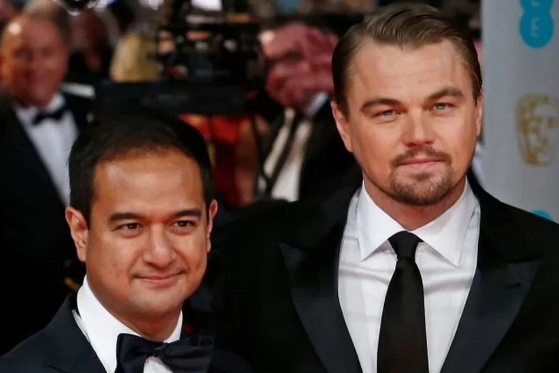 Leonardo DiCaprio with Malaysian film producer Riza Aziz. (Image via Getty Images)
