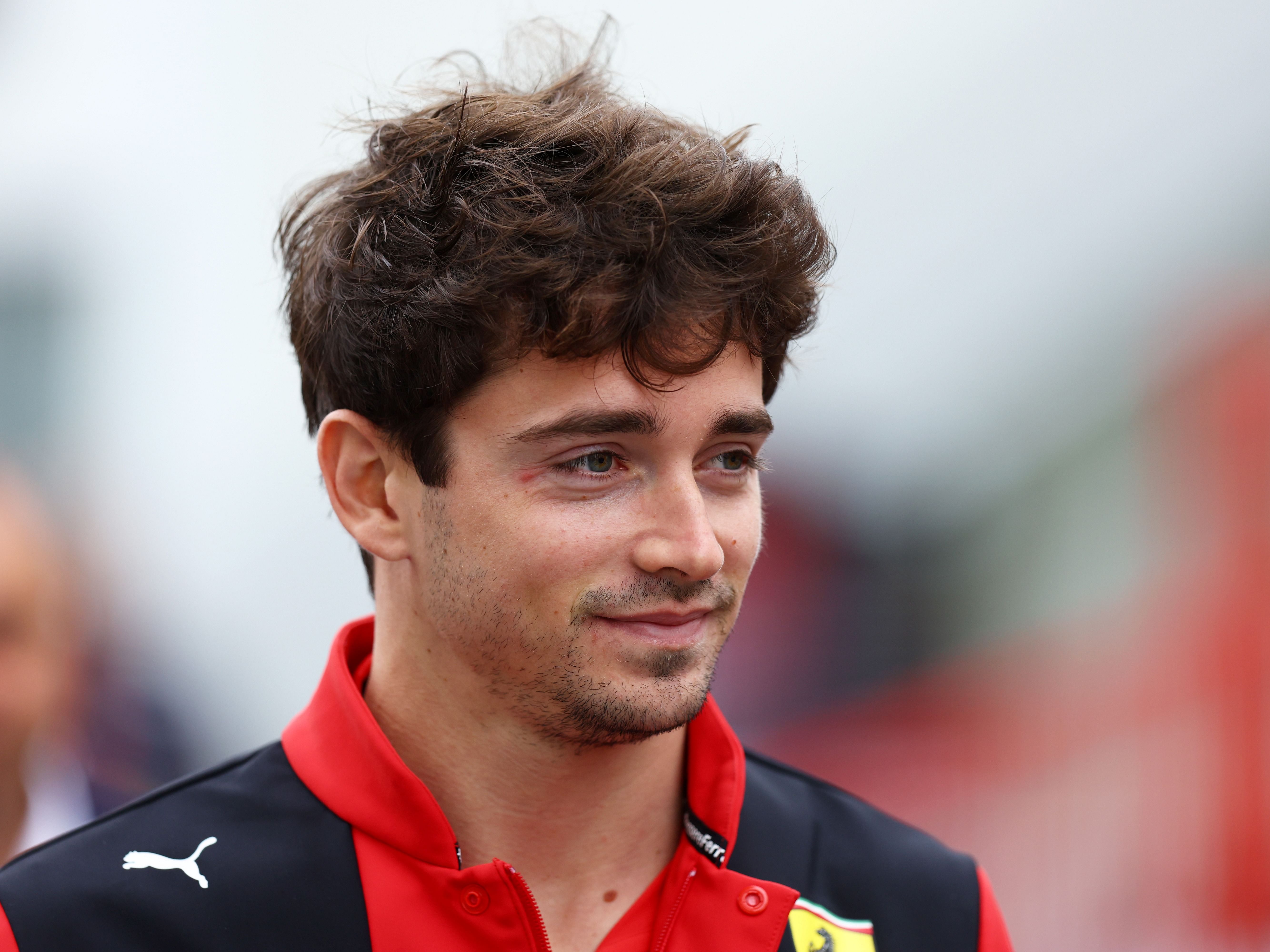 Charles Leclerc looks on in the paddock prior to practice ahead of the 2023 F1 Azerbaijan Grand Prix. (Photo by Francois Nel/Getty Images)