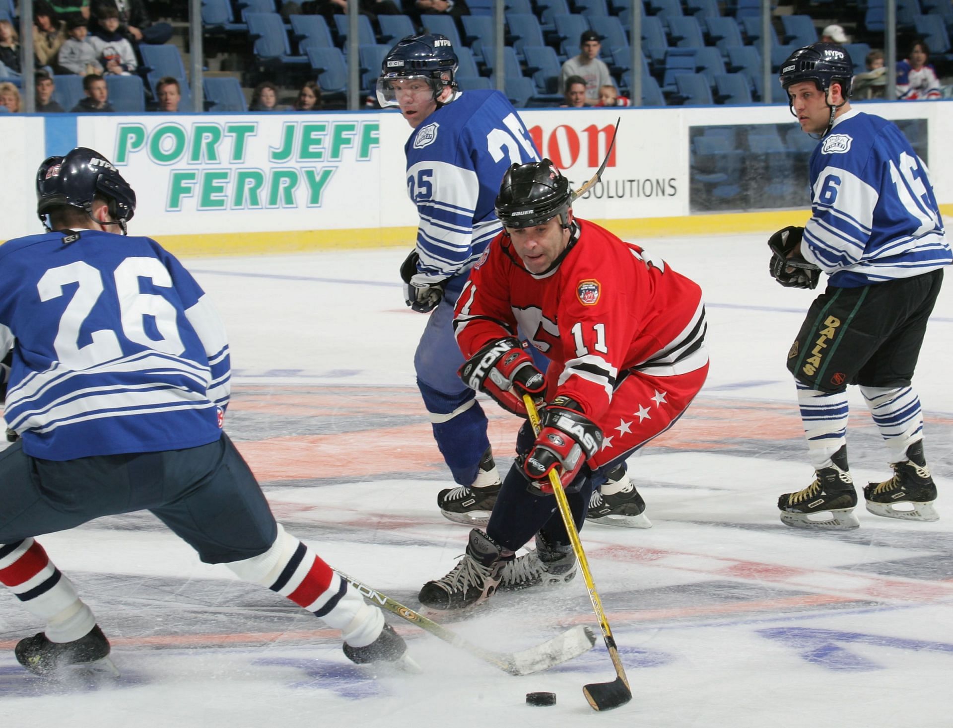 Charity Ice Hockey Game Between NYPD And FDNY Takes An Expected