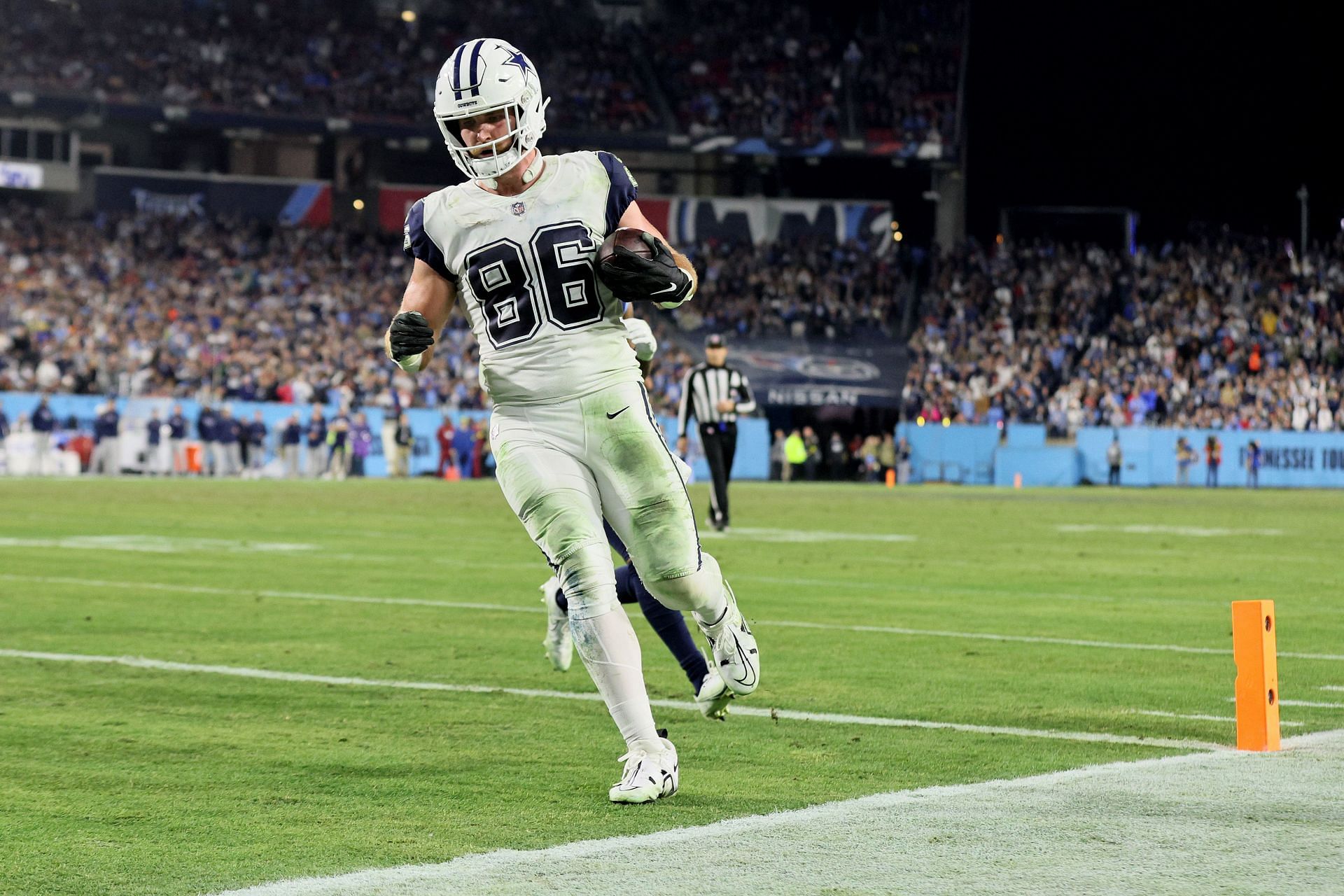 Dalton Schultz in action during Dallas Cowboys v Tennessee Titans