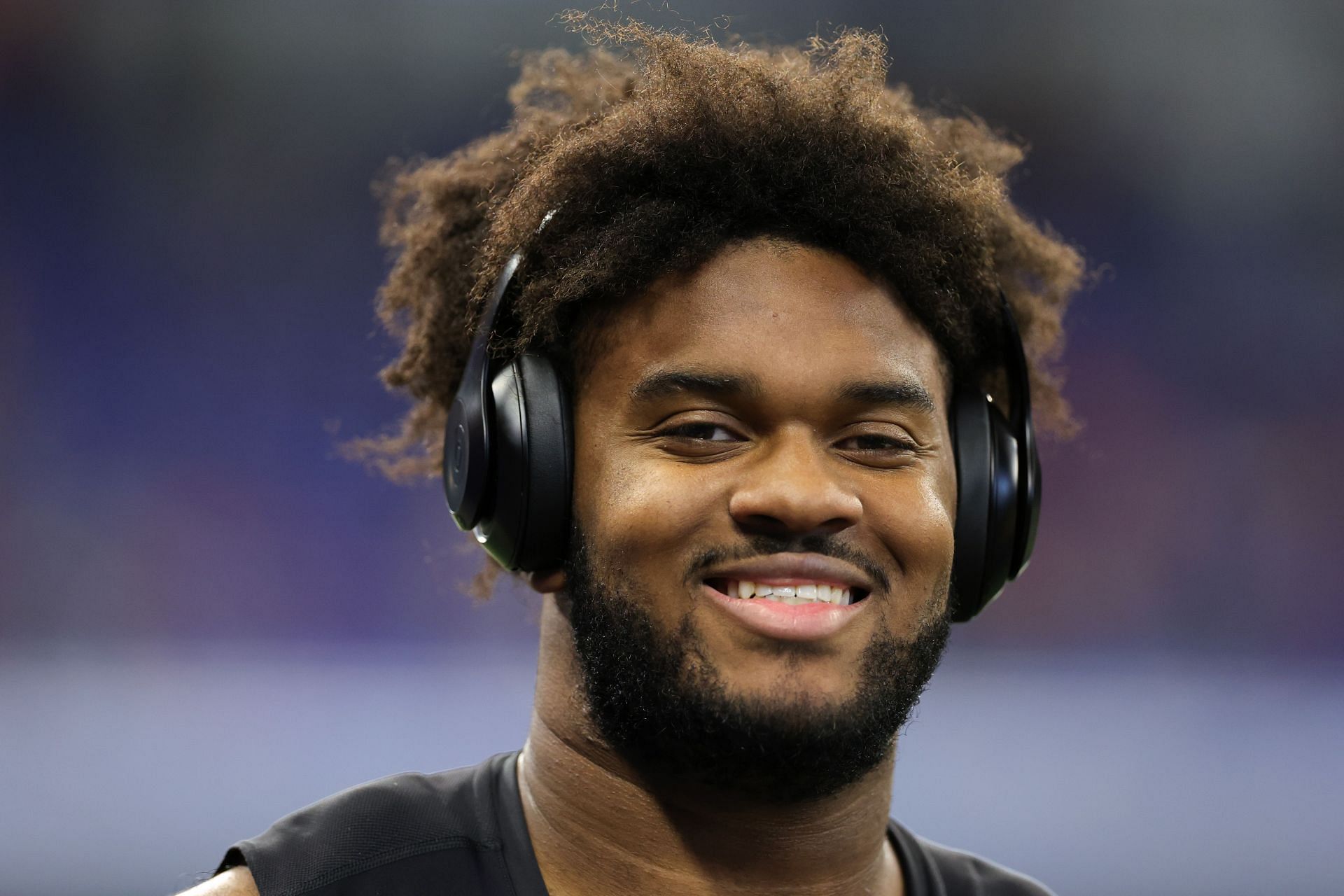 Paris Johnson Jr. of Ohio State looks on during the NFL Combine