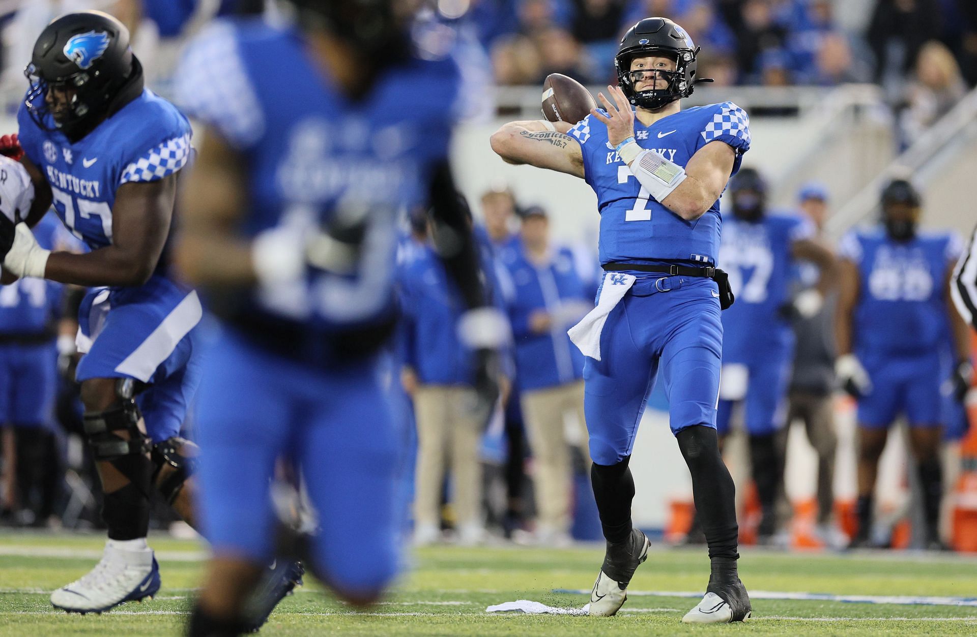 Will Levis #7 of the Kentucky Wildcats throws a pass against the Louisville Cardinals at Kroger Field 