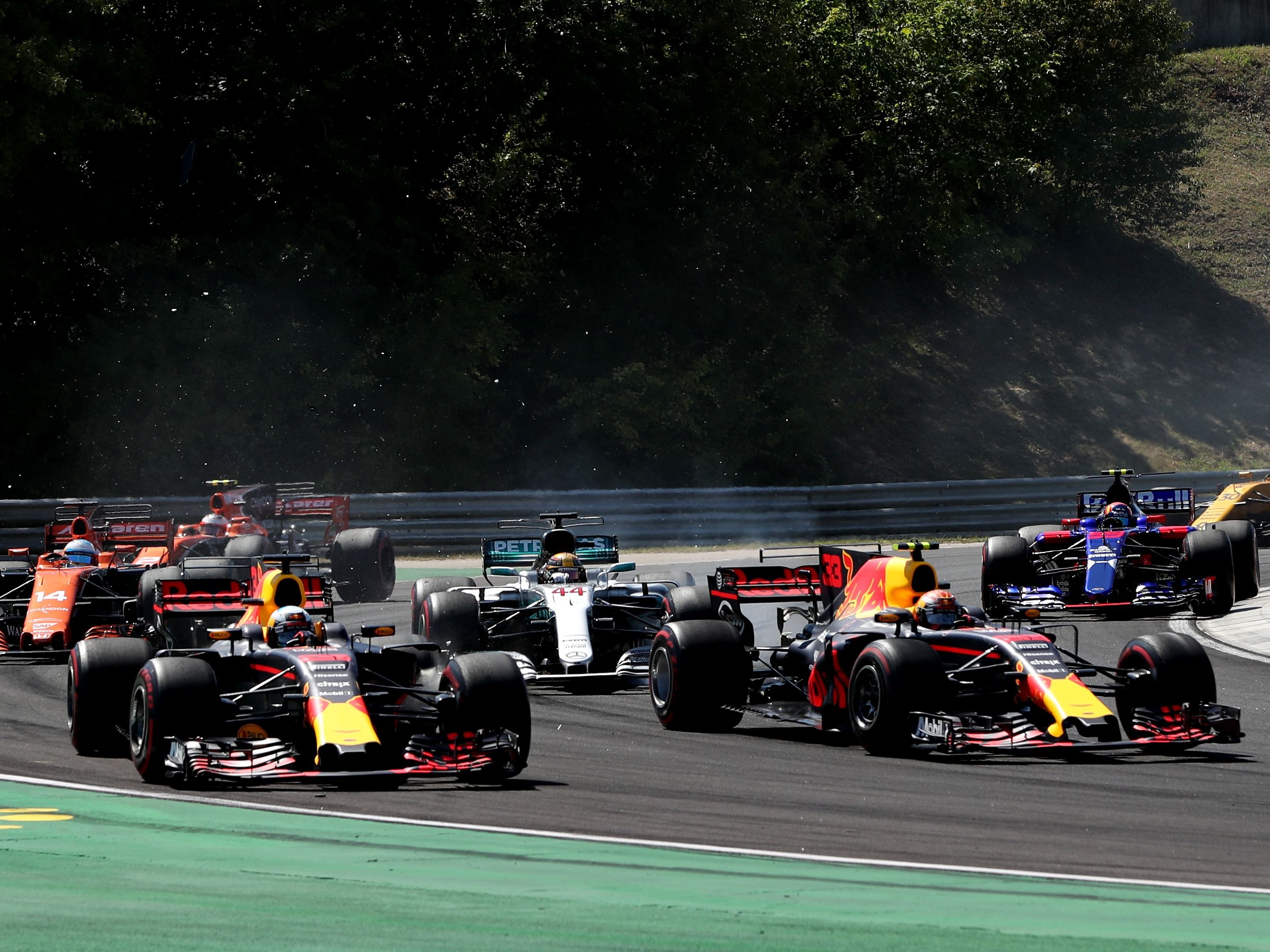 Daniel Ricciardo (3) and Max Verstappen (33) round the second corner during the 2017 F1 Hungarian Grand Prix. (Photo by Will Taylor-Medhurst/Getty Images)