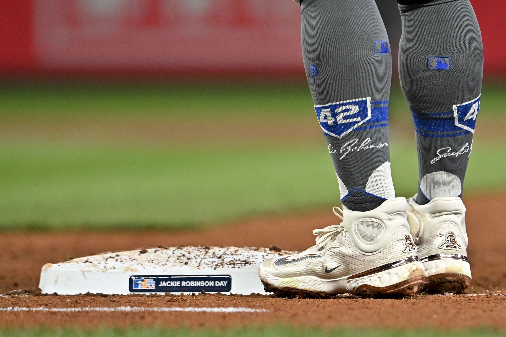 Kolten Wong wears Stance socks with commemorative &ldquo;42&rdquo; logo, Nike &quot;42&quot; shoes, in honor of Jackie Robinson Day at T-Mobile Park