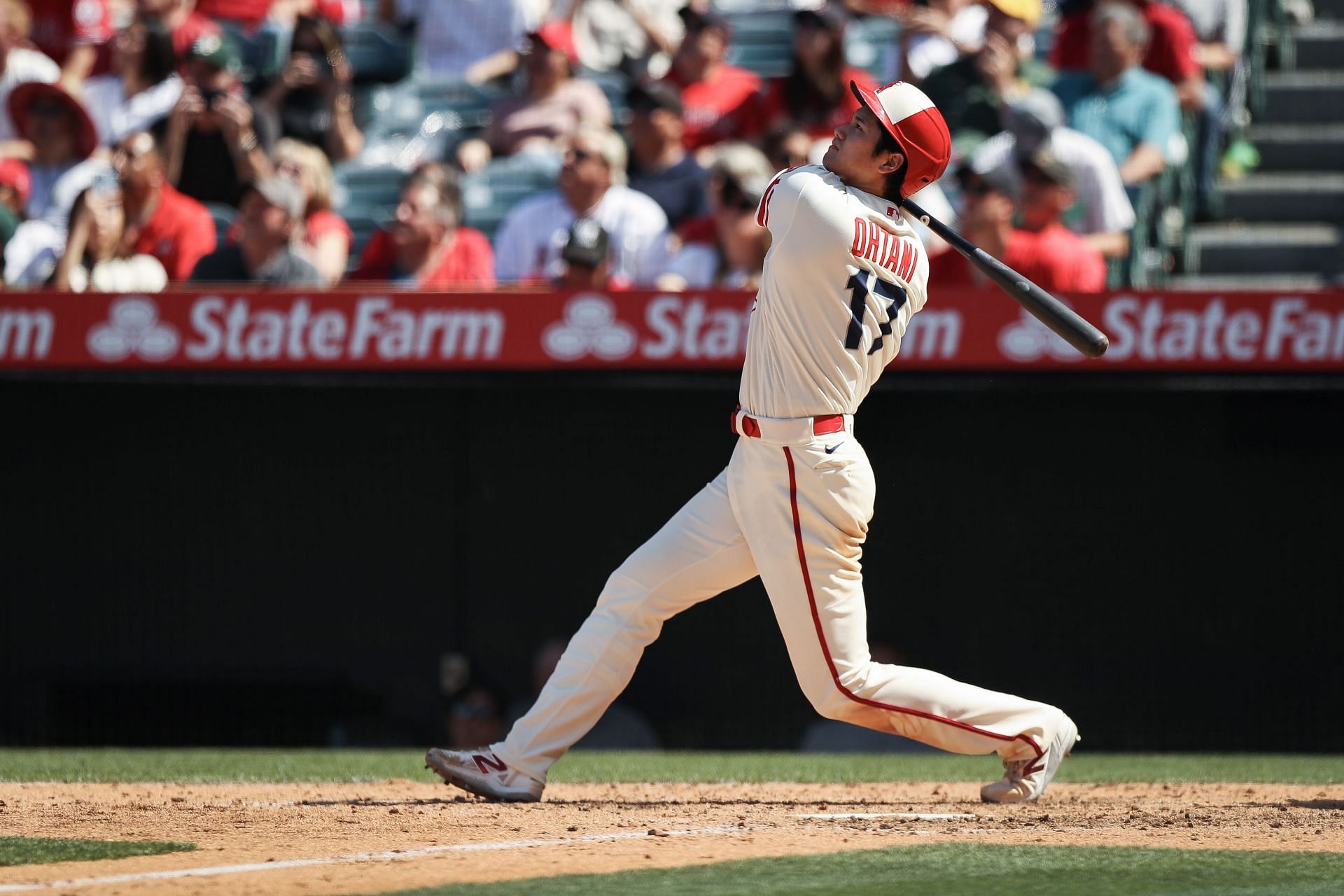 Shohei Ohtani #17 of the Los Angeles Angels hits a triple in the sixth inning against the Oakland Athletics