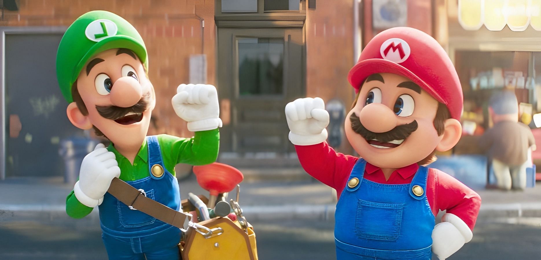Mario and Luigi frantically run through the busy streets of Brooklyn. (Image via Universal Pictures)