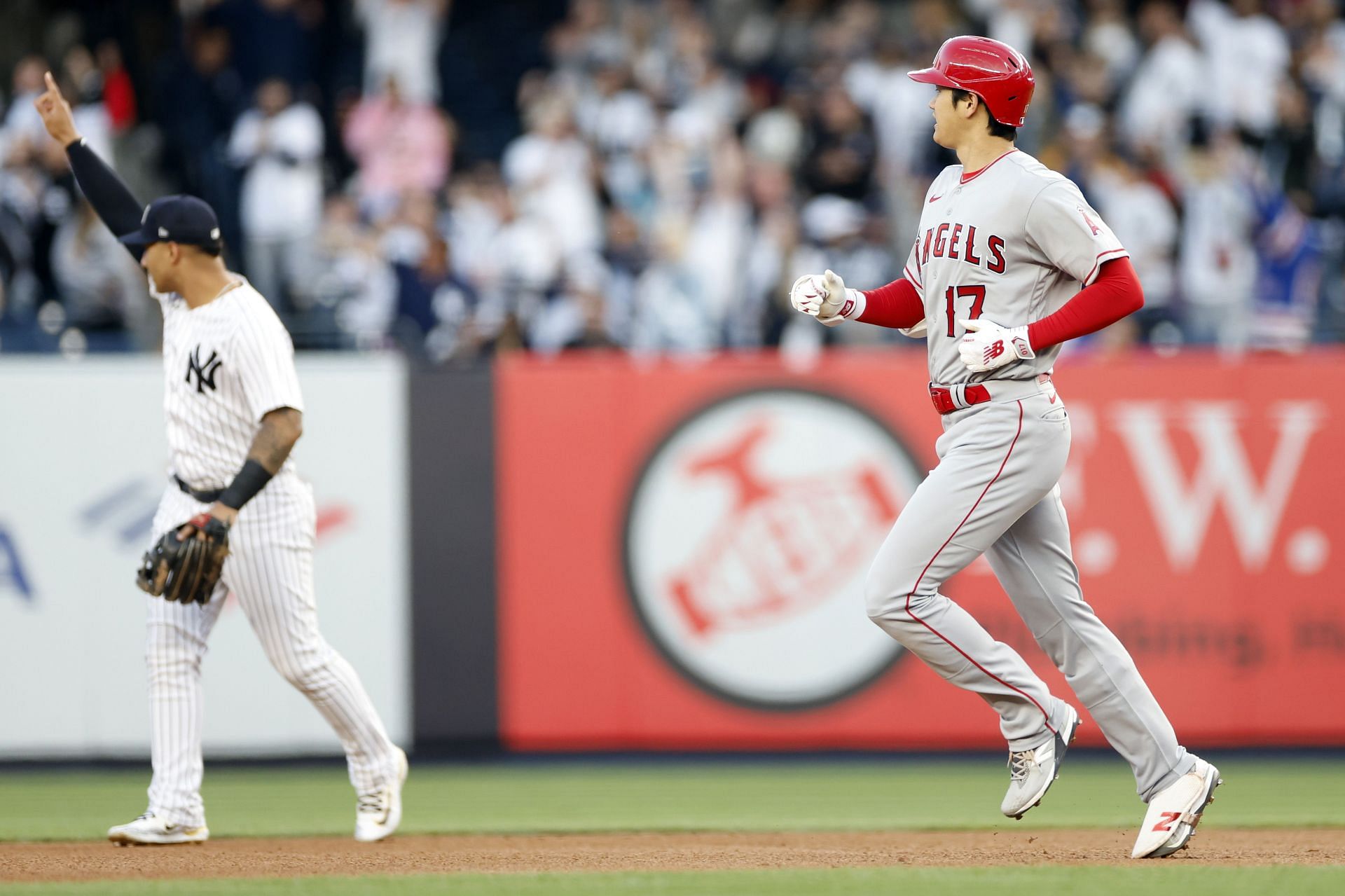 Shohei Ohtani #17 of the Los Angeles Angels looks on as Aaron Judge #99 of the New York Yankees (not pictured) makes a catch for an out during the first inning at Yankee Stadium on April 19, 2023