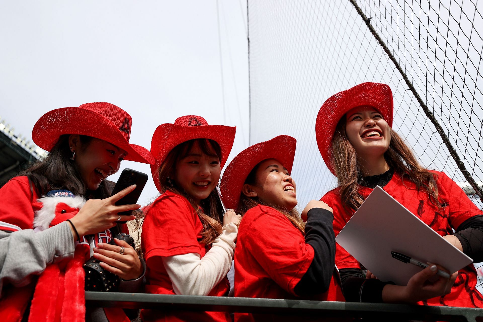 Fans cheer for Shohei Ohtani of the Los Angeles Angels before the game against the Seattle Mariners