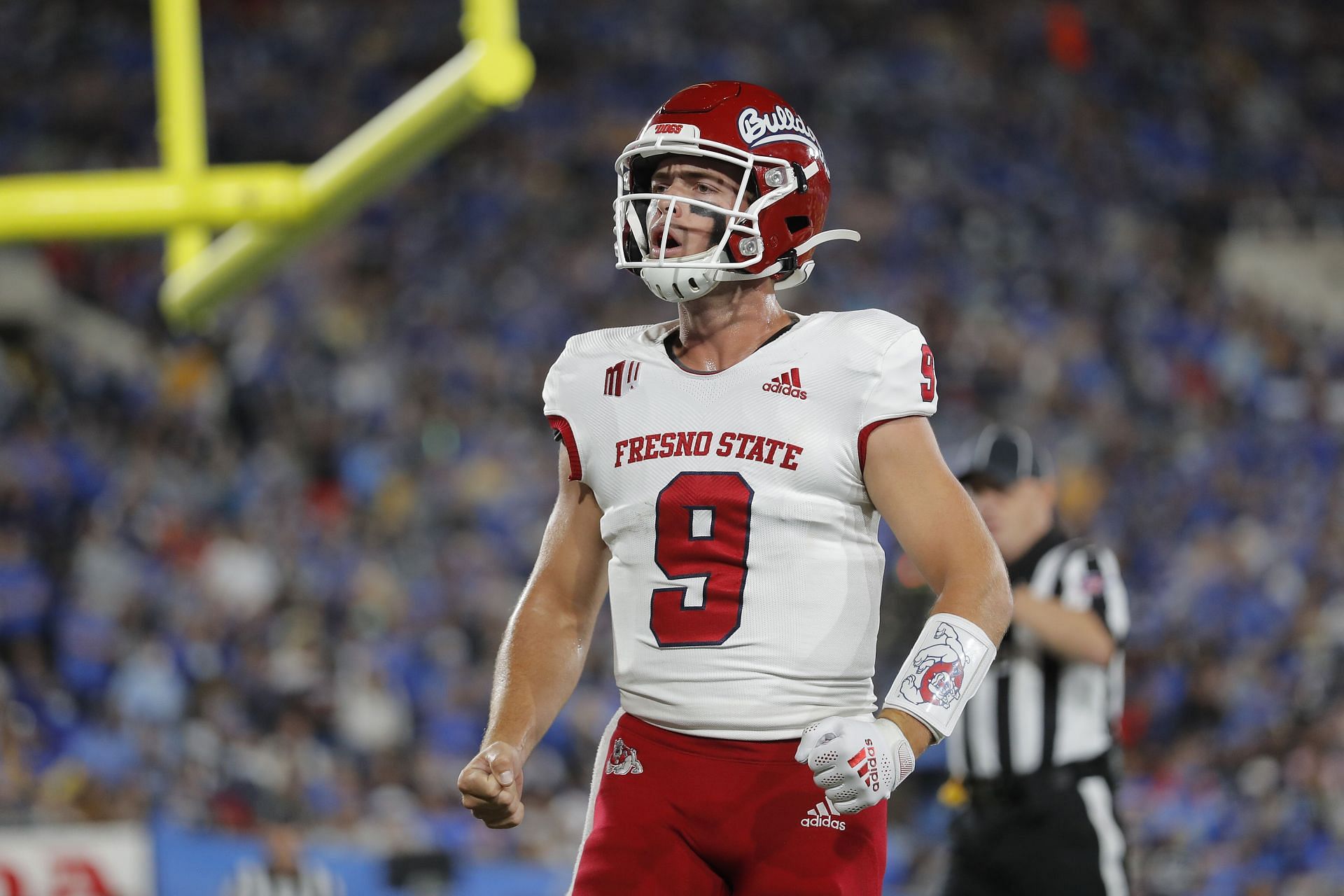 Jake Haener #9 of the Fresno State Bulldogs celebrates a touchdown against the UCLA Bruins