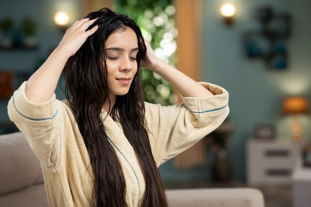 The Power of Touch: Discovering the Health Benefits of Scalp Massage (Image via Getty)