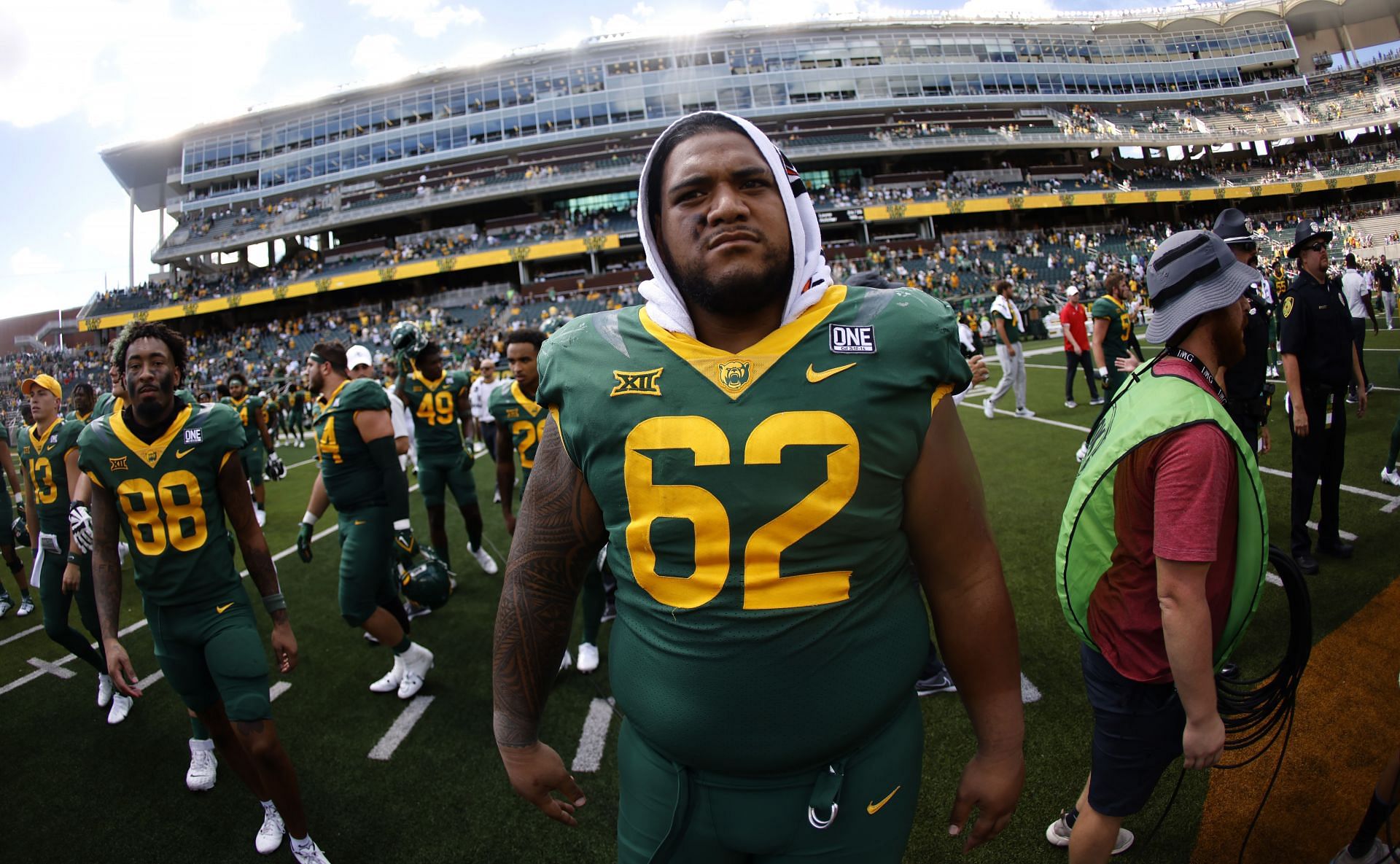Siaki Ika #62 of the Baylor Bears walks off the field following Baylors 42-7 win over Texas State 