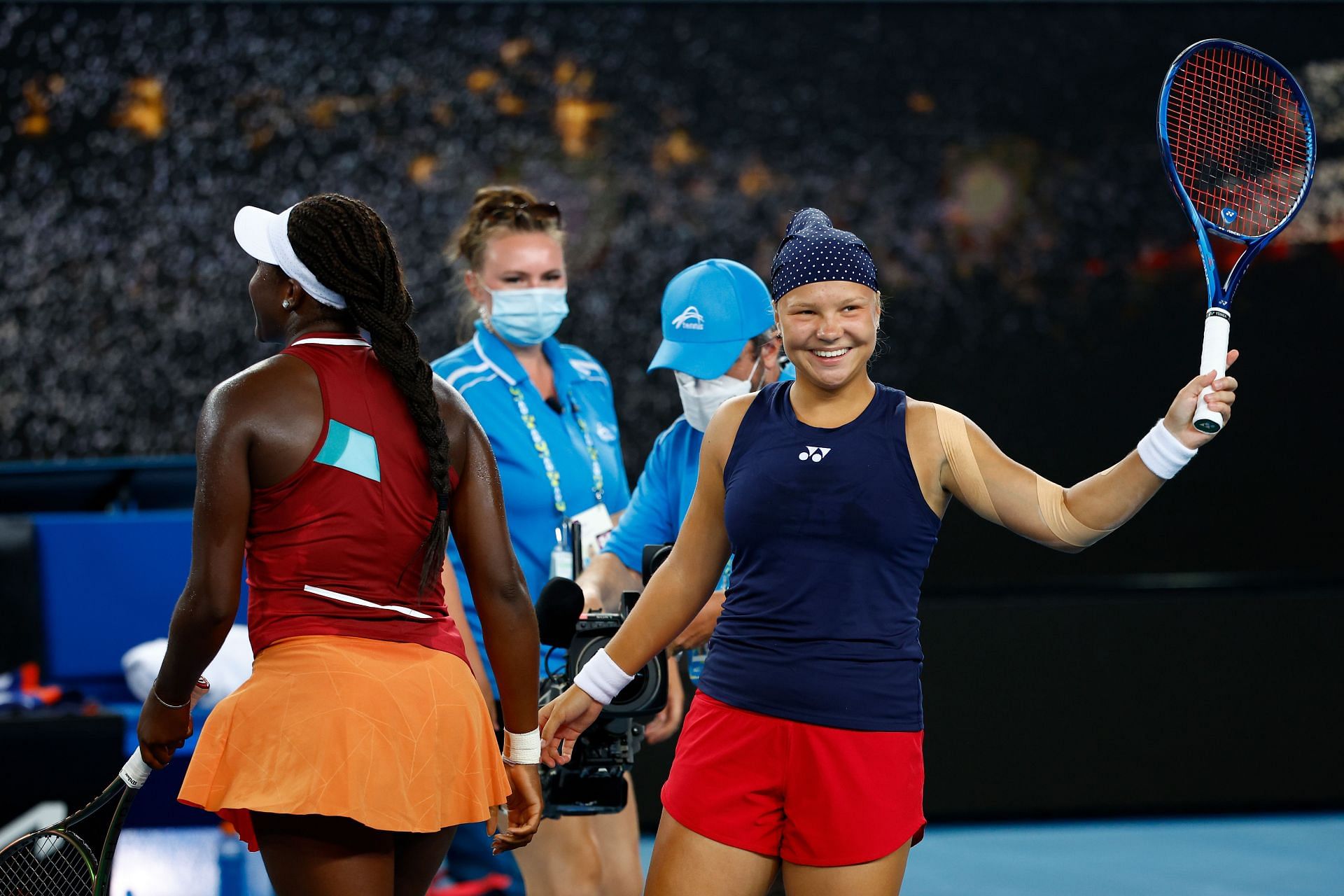 Shnaider in action in the girls doubles competition at the 2022 Australian Open