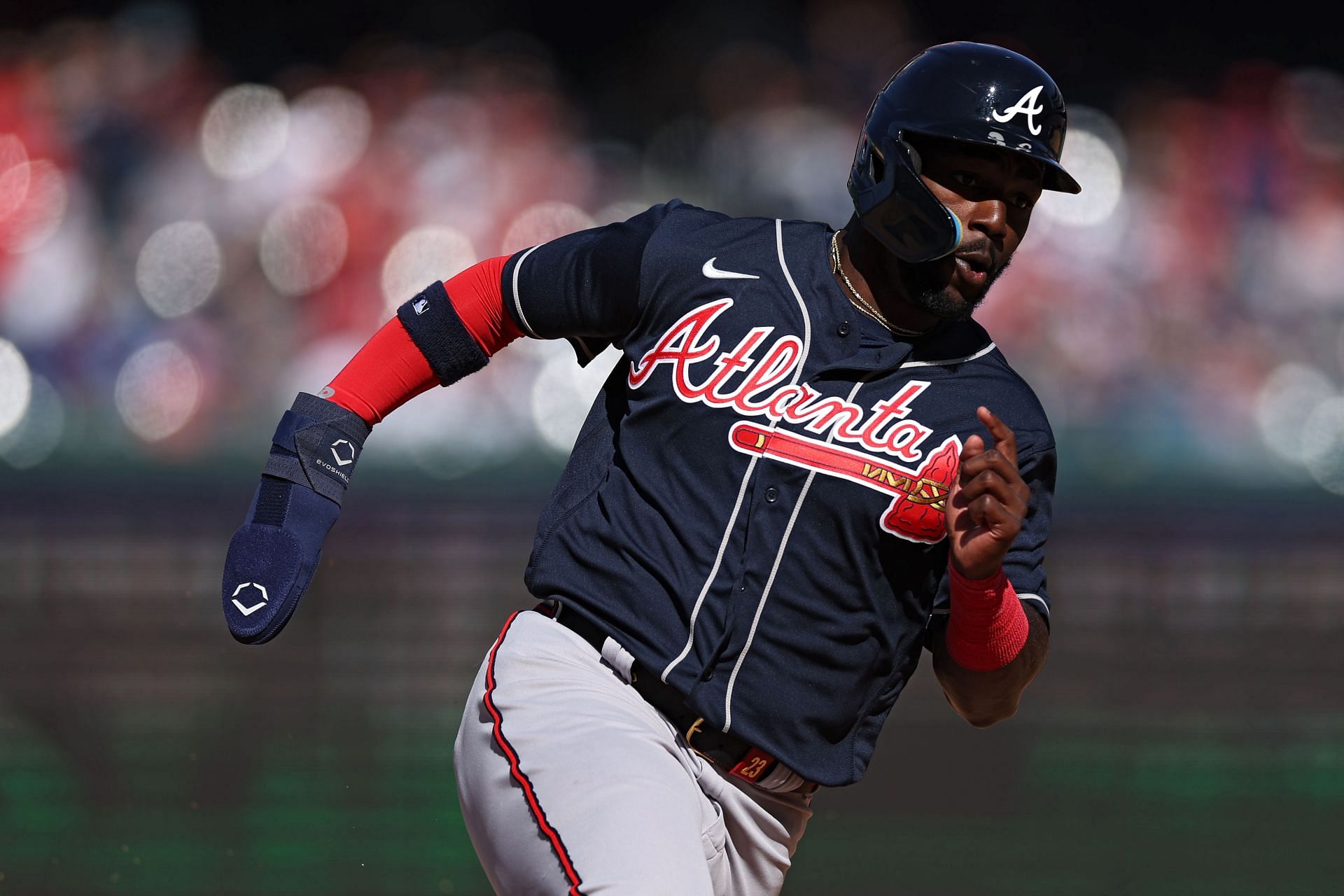 Michael Harris II #23 of the Atlanta Braves rounds third base before scoring