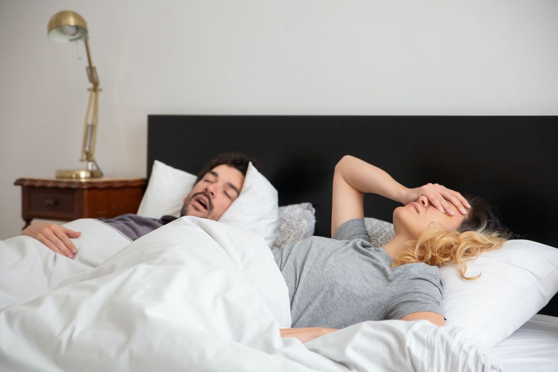 Why do people snore? (Image via Pexels/ Kampus Production)