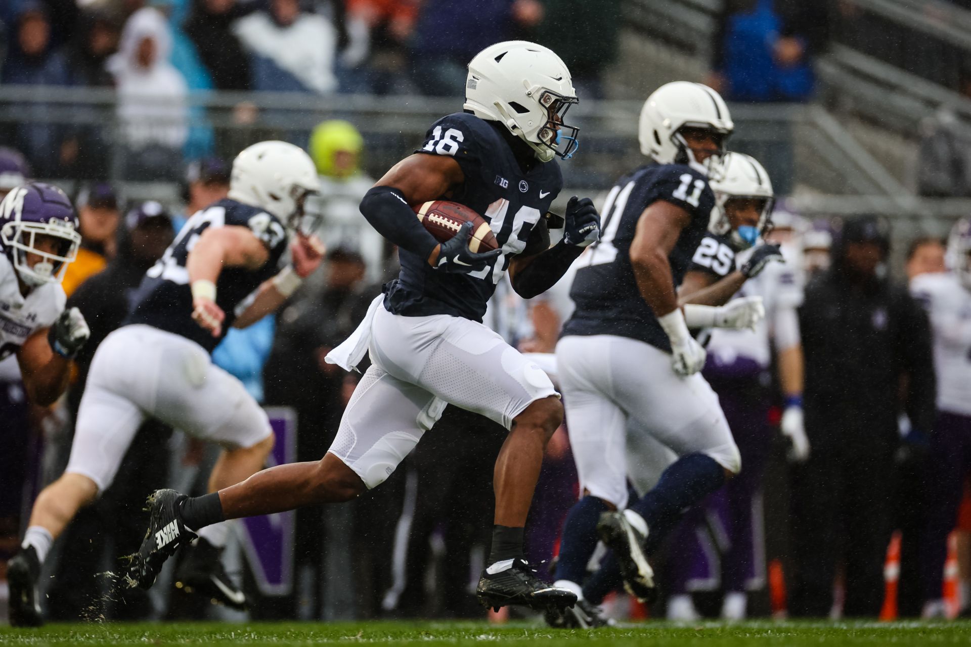  Ji'Ayir Brown #16 of the Penn State Nittany Lions returns an interception against the Northwestern Wildcats