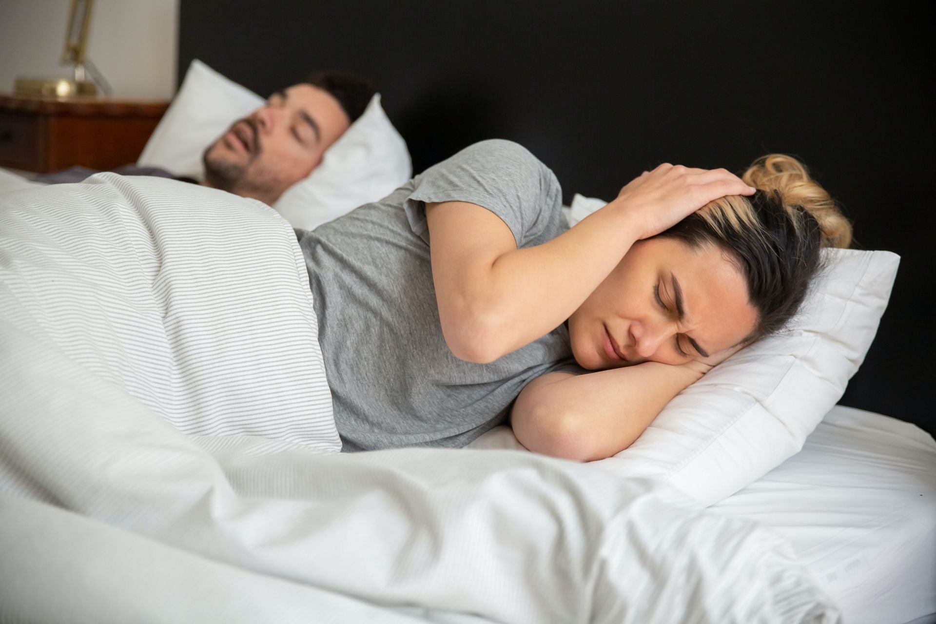 Why do people snore? Nose congestion can be the cause. (Image via Pexels/ Kampus Production)