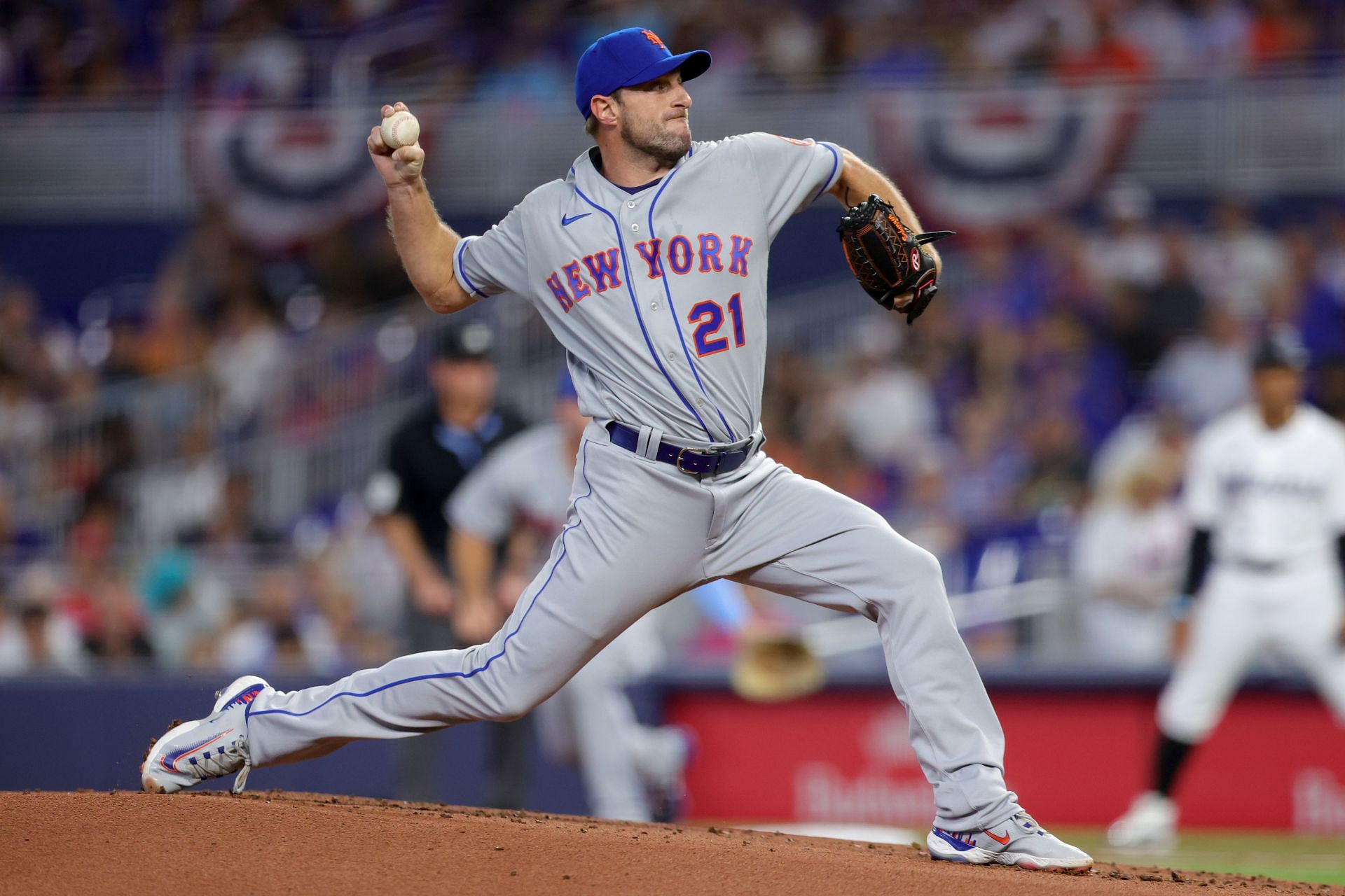 Max Scherzer #21 of the New York Mets delivers a pitch against the Miami Marlins during the first inning on Opening Day at loanDepot park