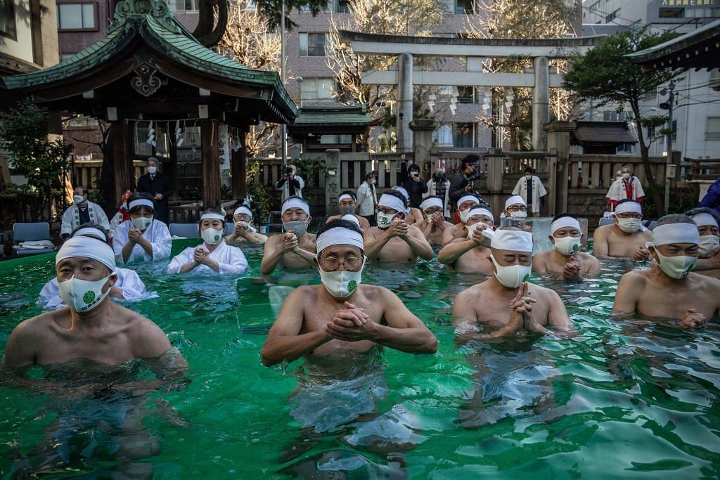 Participants bathe in ice-cold water during the annual new year Shinto ritual (Image via Getty Images)