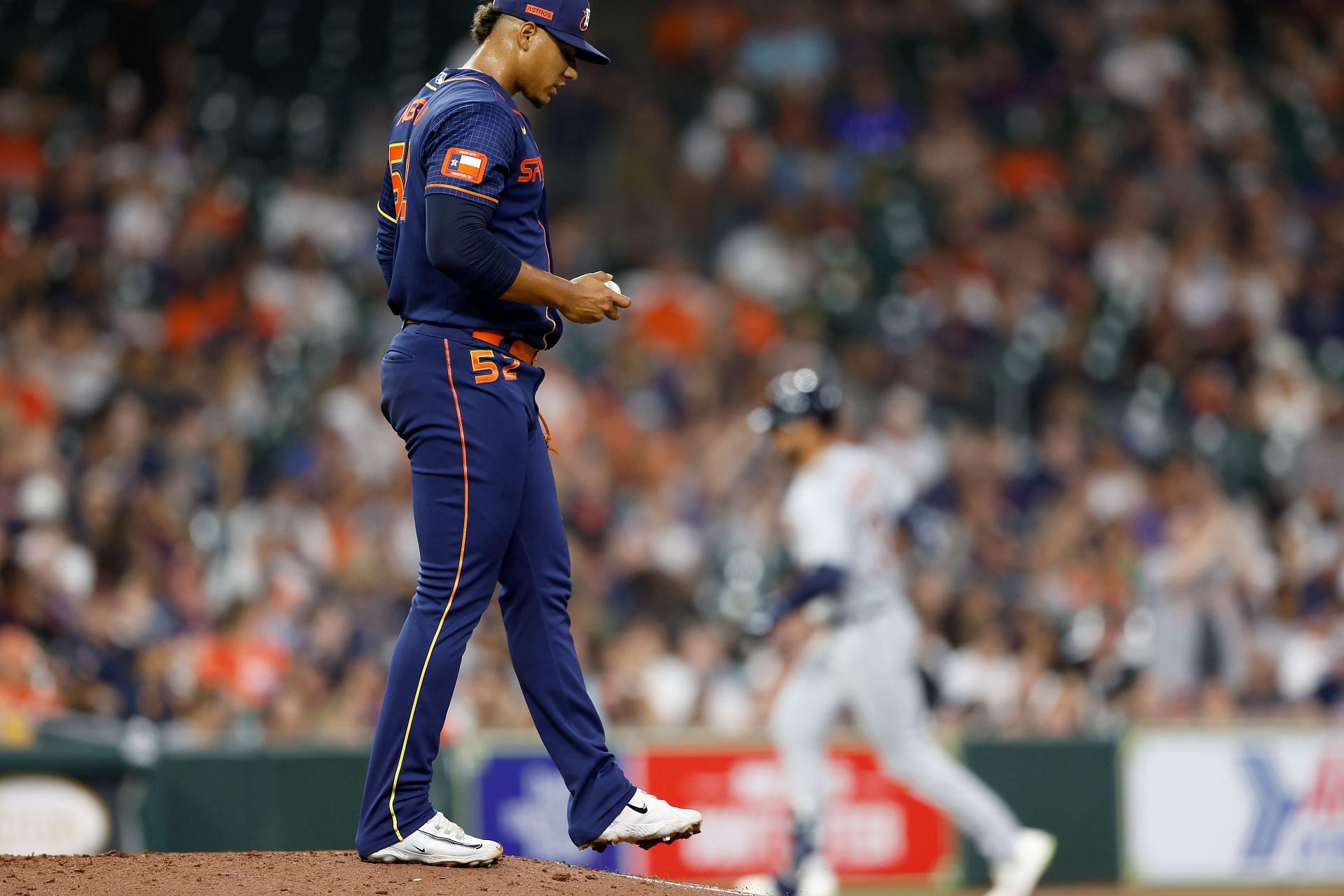 Bryan Abreu of the Houston Astros reacts after giving up a solo home run against the Detroit Tigers at Minute Maid Par