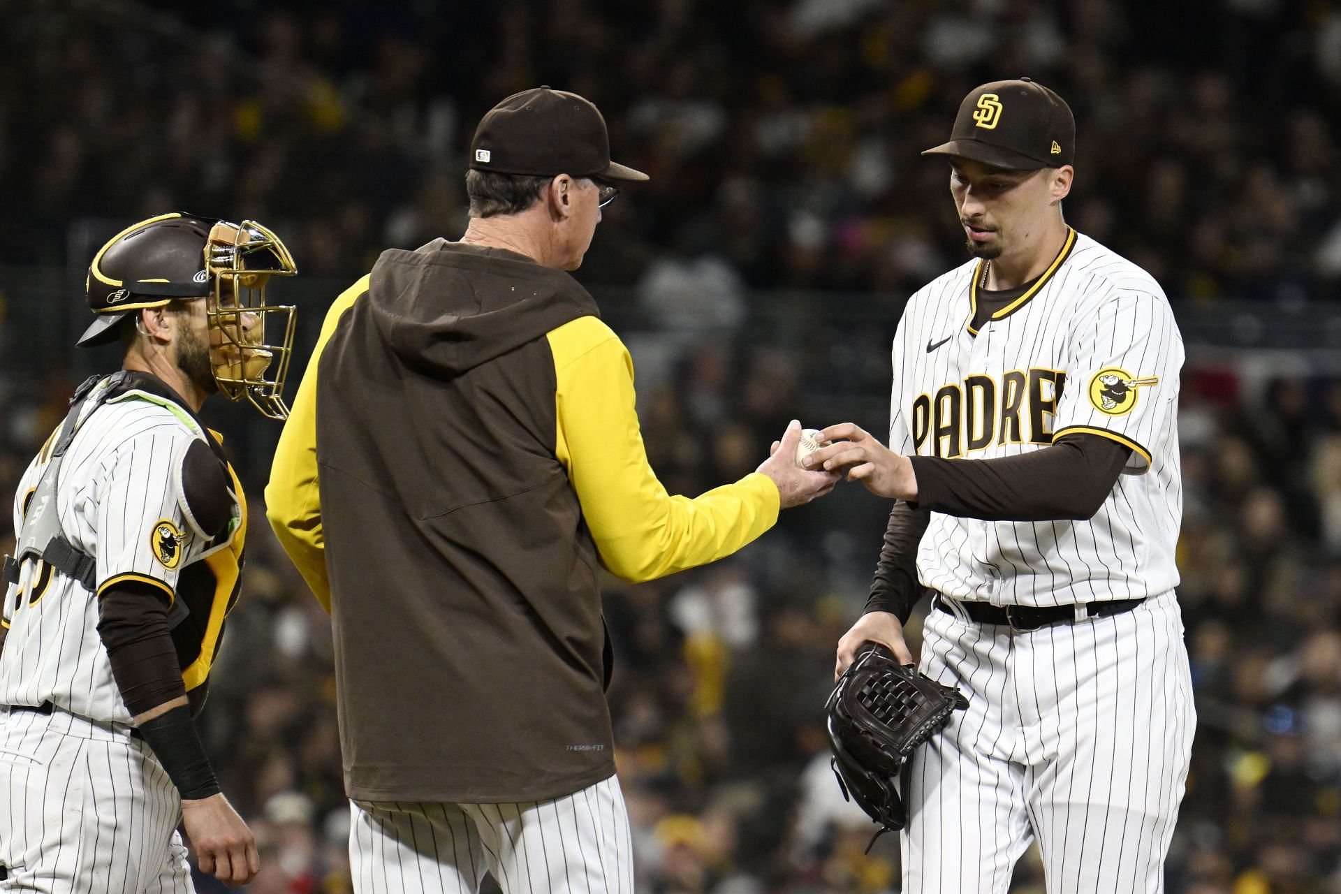 Blake Snell hands the ball to manager Bob Melvin as he leaves the game during the fourth inning at Petco Park