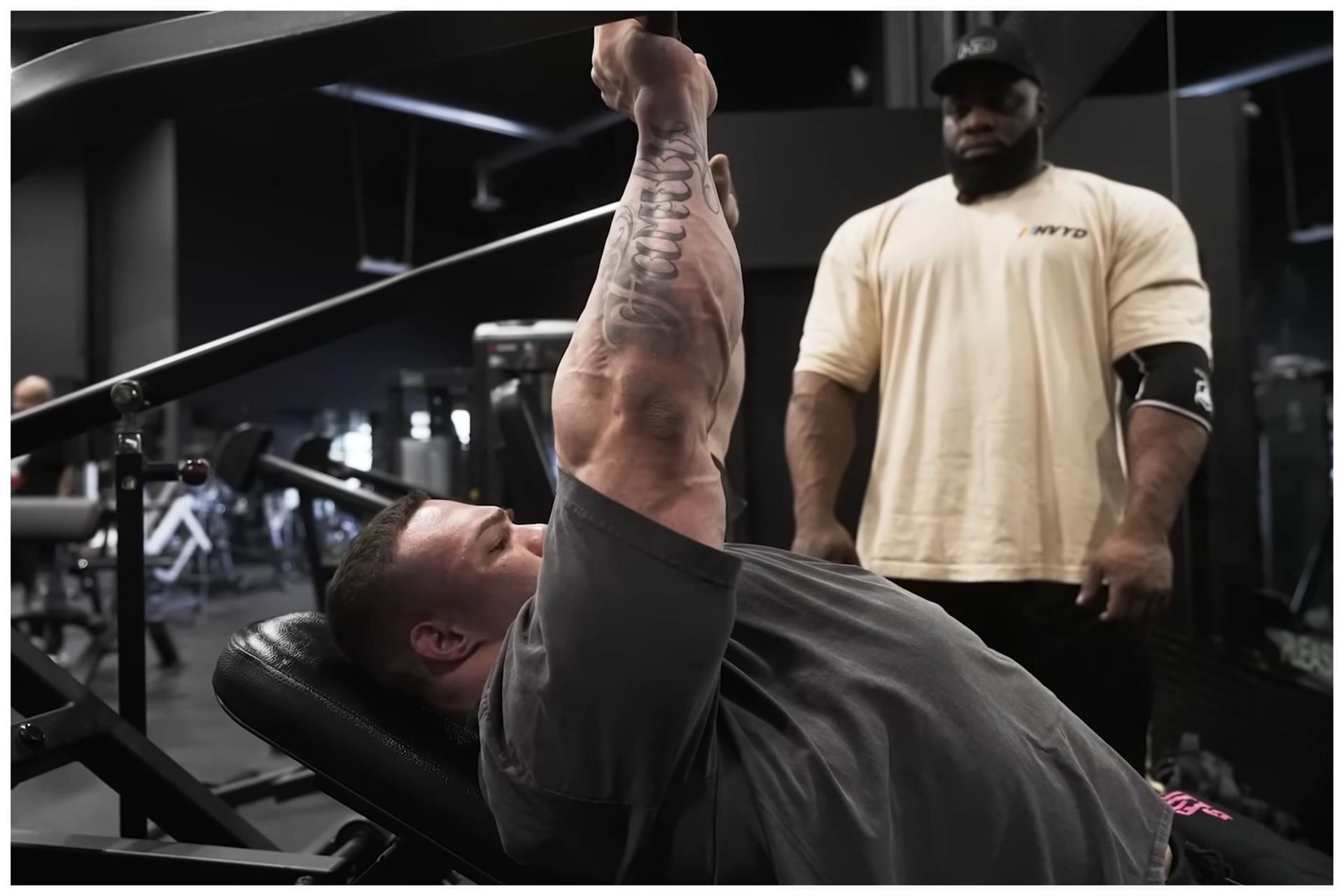 Nick Walker performs the inclined press as Quinton Eriya watches on: Image via YouTube (@HD Muscle)