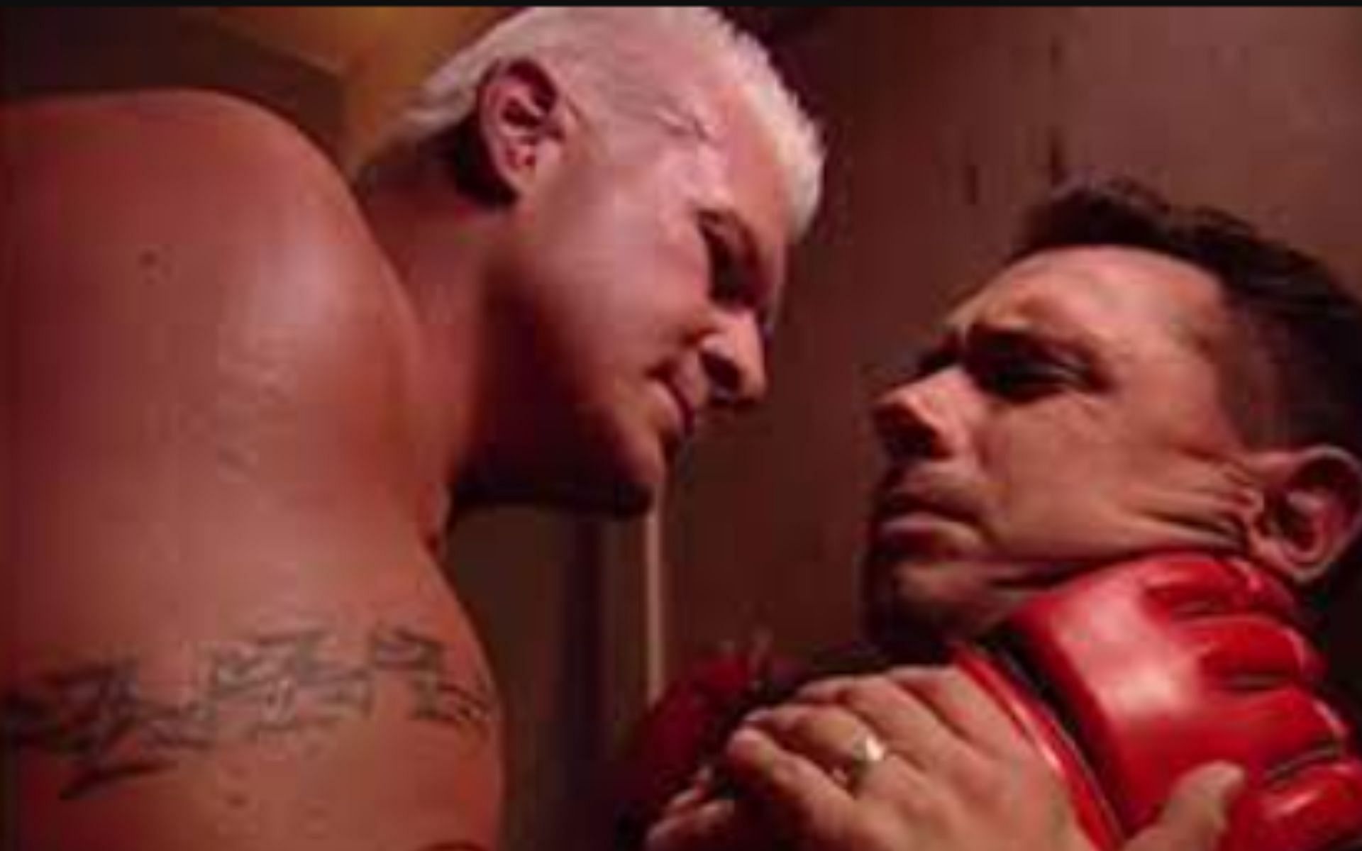 Heidenreich threatening Michael Cole backstage