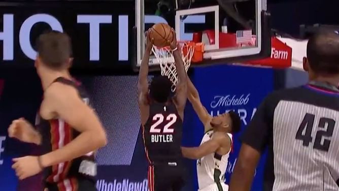 Watch- Jimmy Butler throws down a vicious dunk over Giannis Antetokounmpo