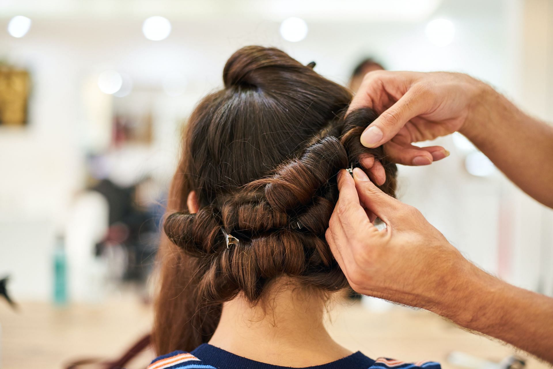 Maintain hair health while wearing protective styles with simple tips (Image via Pexels)