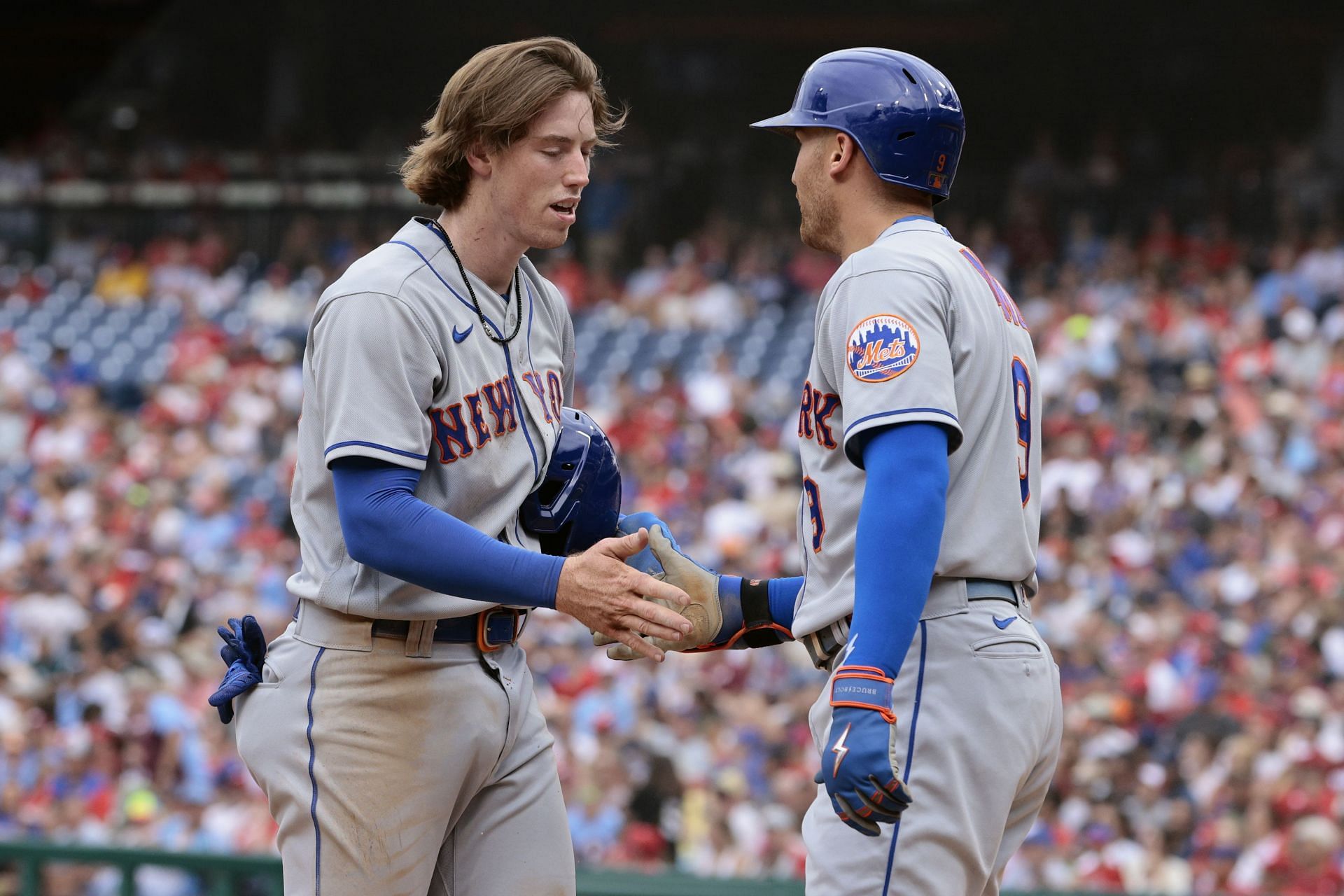 Brett Baty #22 of the New York Mets is congratulated by Brandon Nimmo