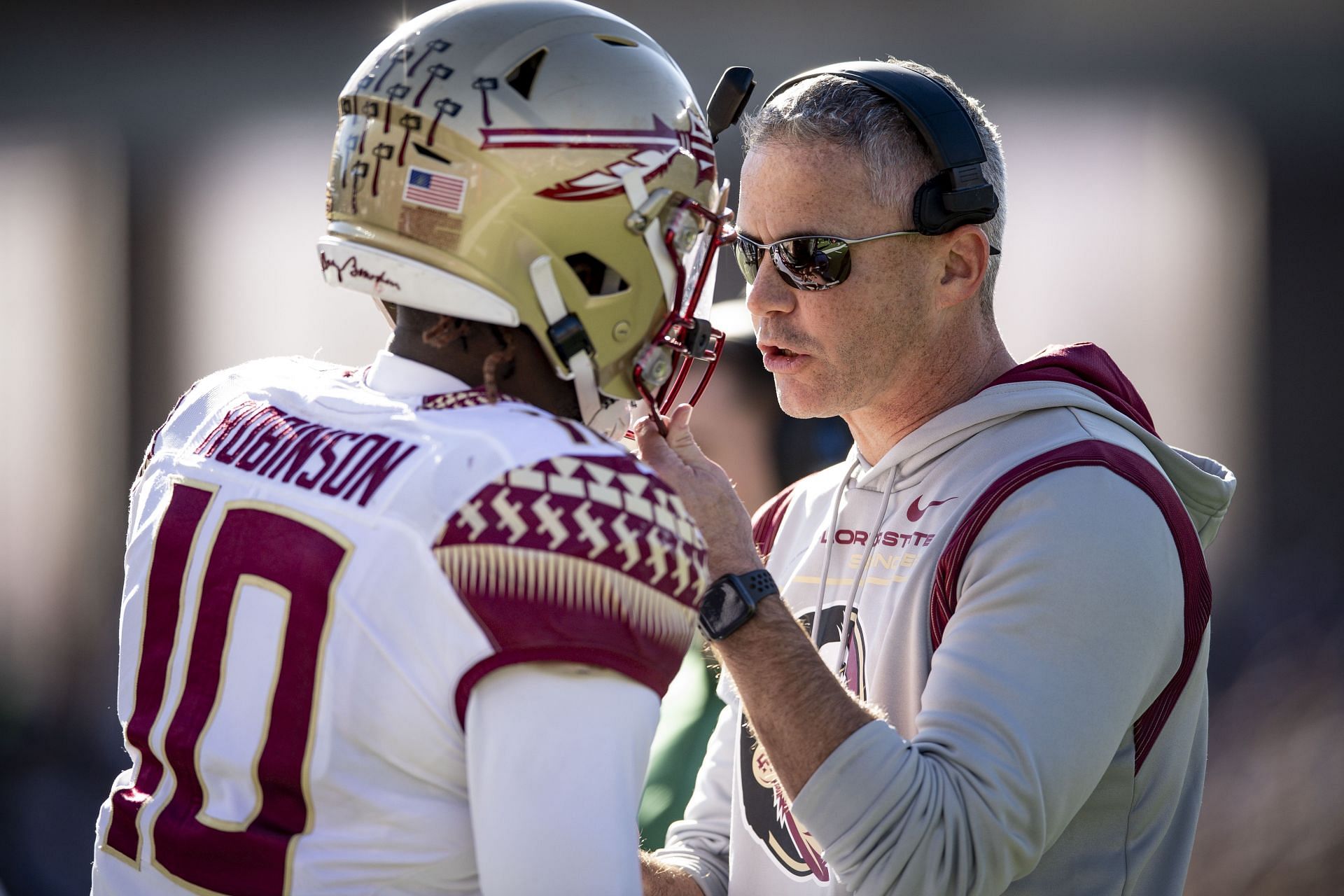  Head coach Mike Norvell of the Florida State Seminoles reacts with Jammie Robinson