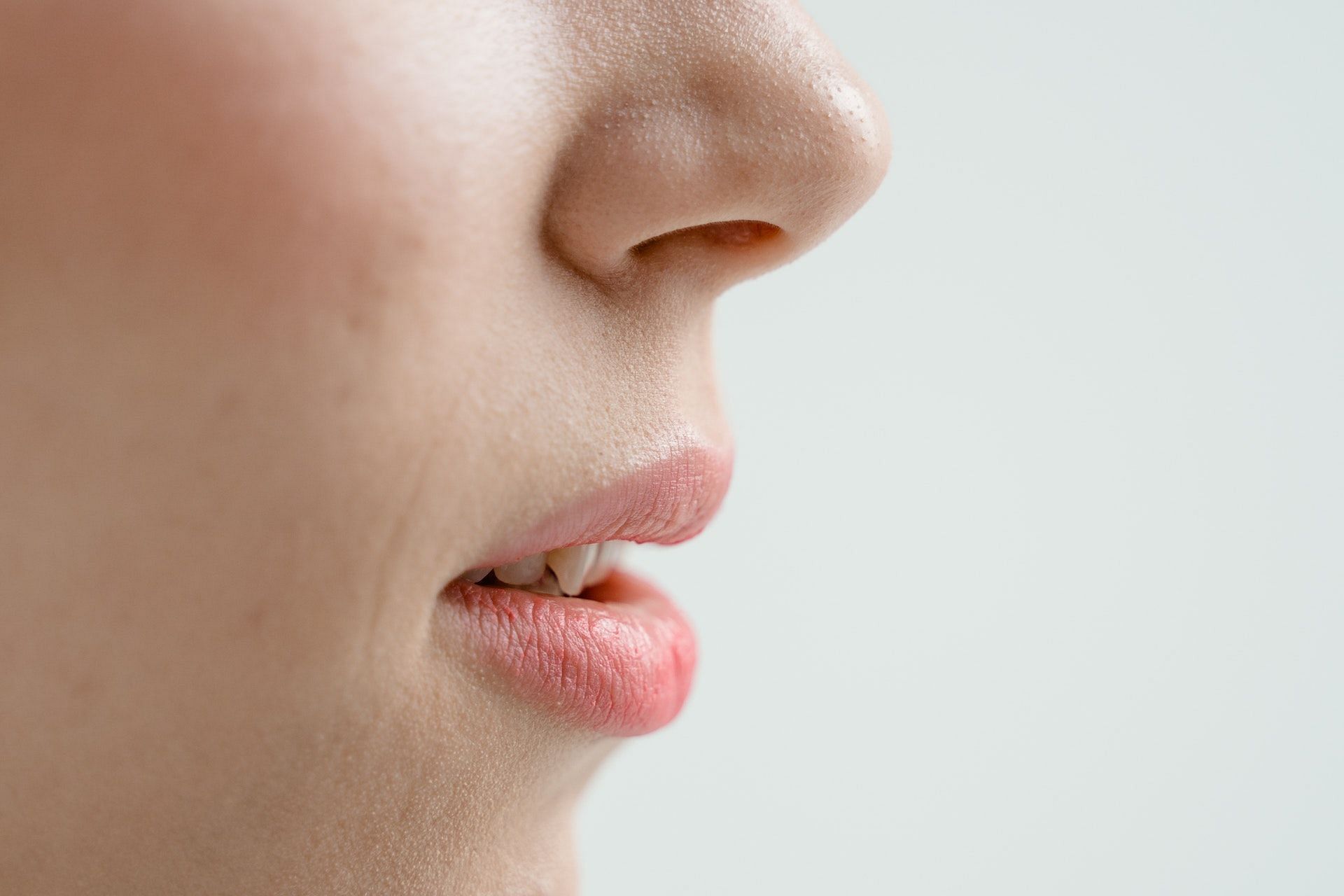 Bump on the lip can be caused due to several reasons. (Photo via Pexels/MART  PRODUCTION)