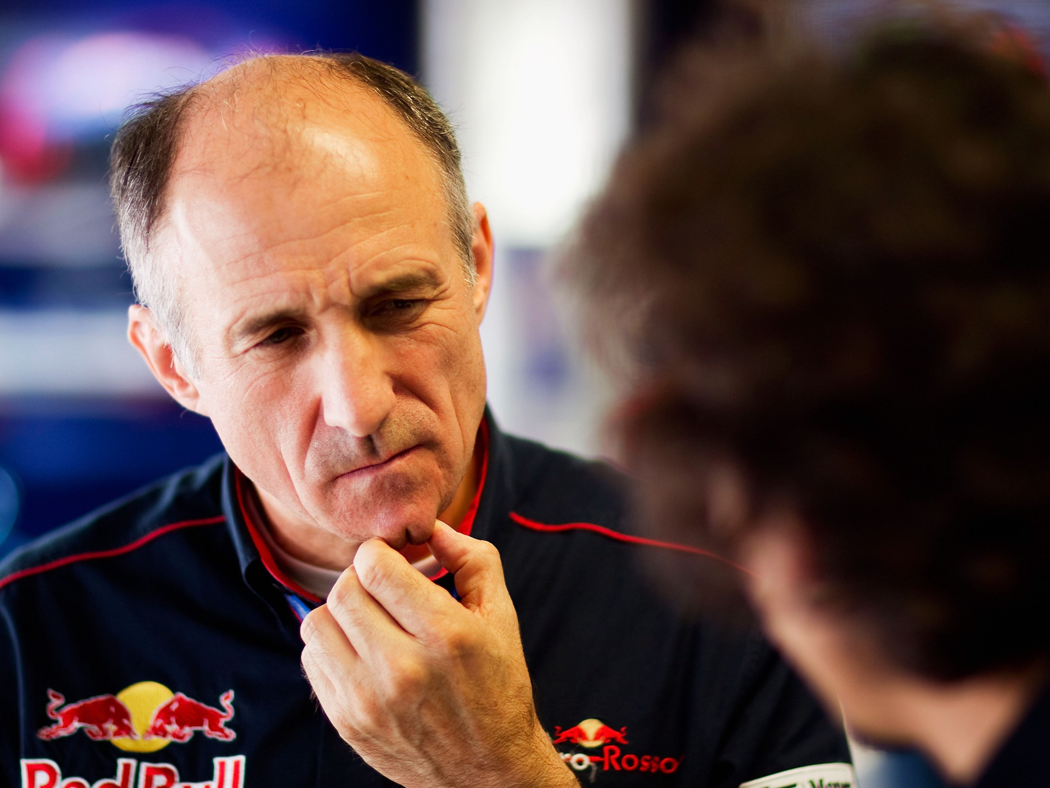 Scuderia Toro Rosso Team Principal Franz Tost (L) talks with Chief Engineer Laurent Mekies (R) during practice for the 2010 F1 Italian Grand Prix. (Photo by Peter Fox/Getty Images)