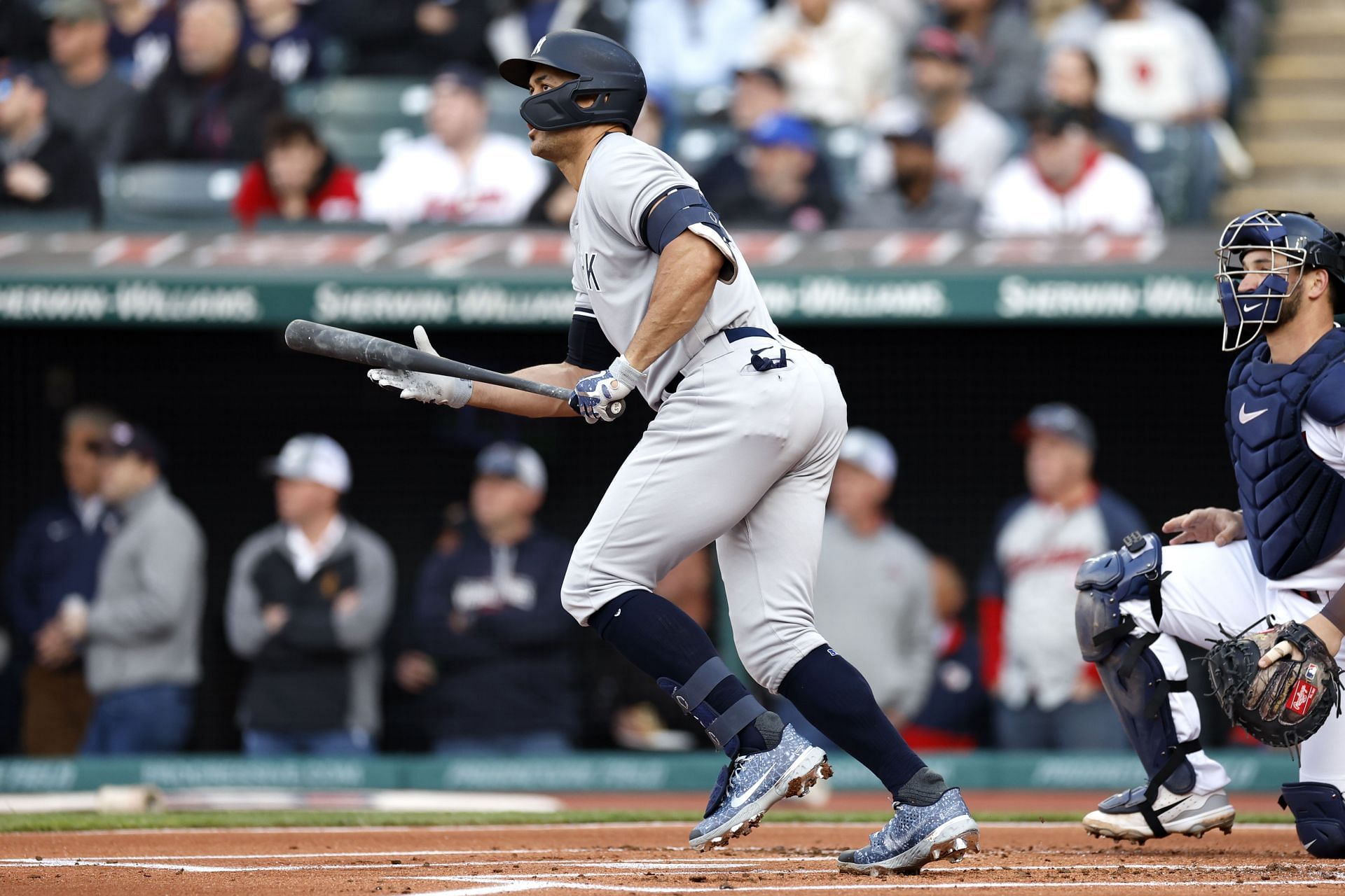 Giancarlo Stanton of the New York Yankees hits a two-run double off Shane Bieber.