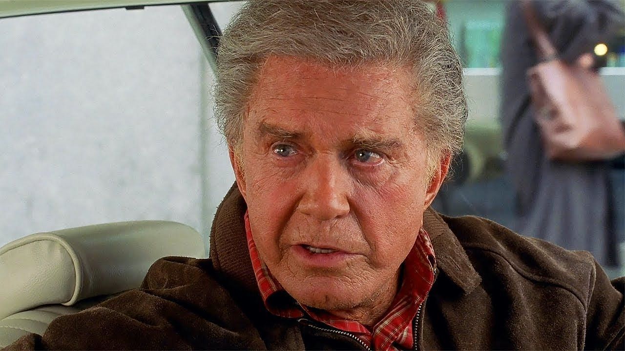 Uncle Ben, played by Cliff Robertson in Spider-Man (2002), delivers one of the most famous quotes in all of superhero lore (Image via Sony Pictures)