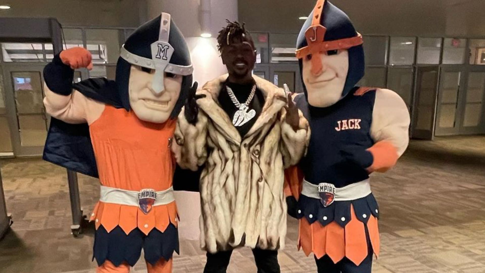 Former NFL WR Antonio Brown with Albany Empire mascots