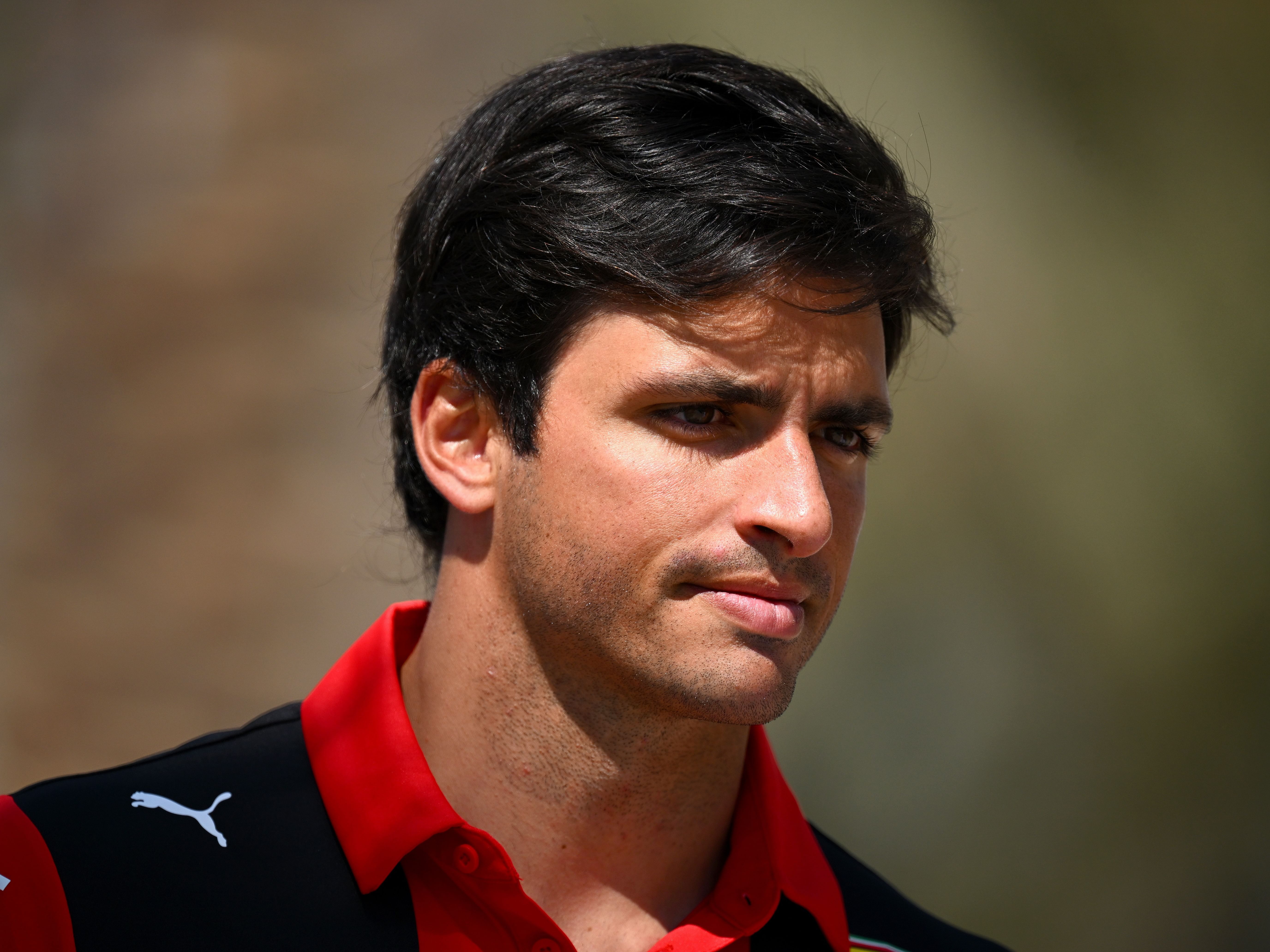 Carlos Sainz walks in the paddock prior to practice ahead of the 2023 F1 Bahrain Grand Prix. (Photo by Clive Mason/Getty Images)