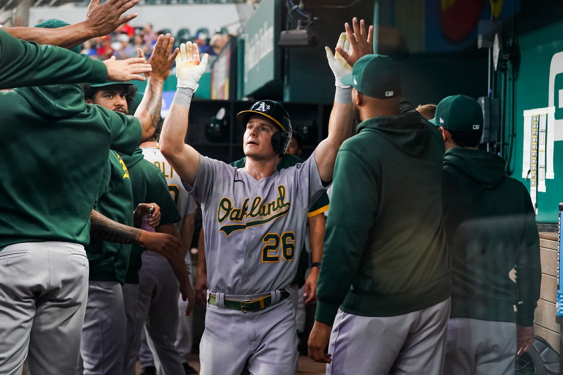 Matt Chapman celebrates in the dugout during his Oakland days