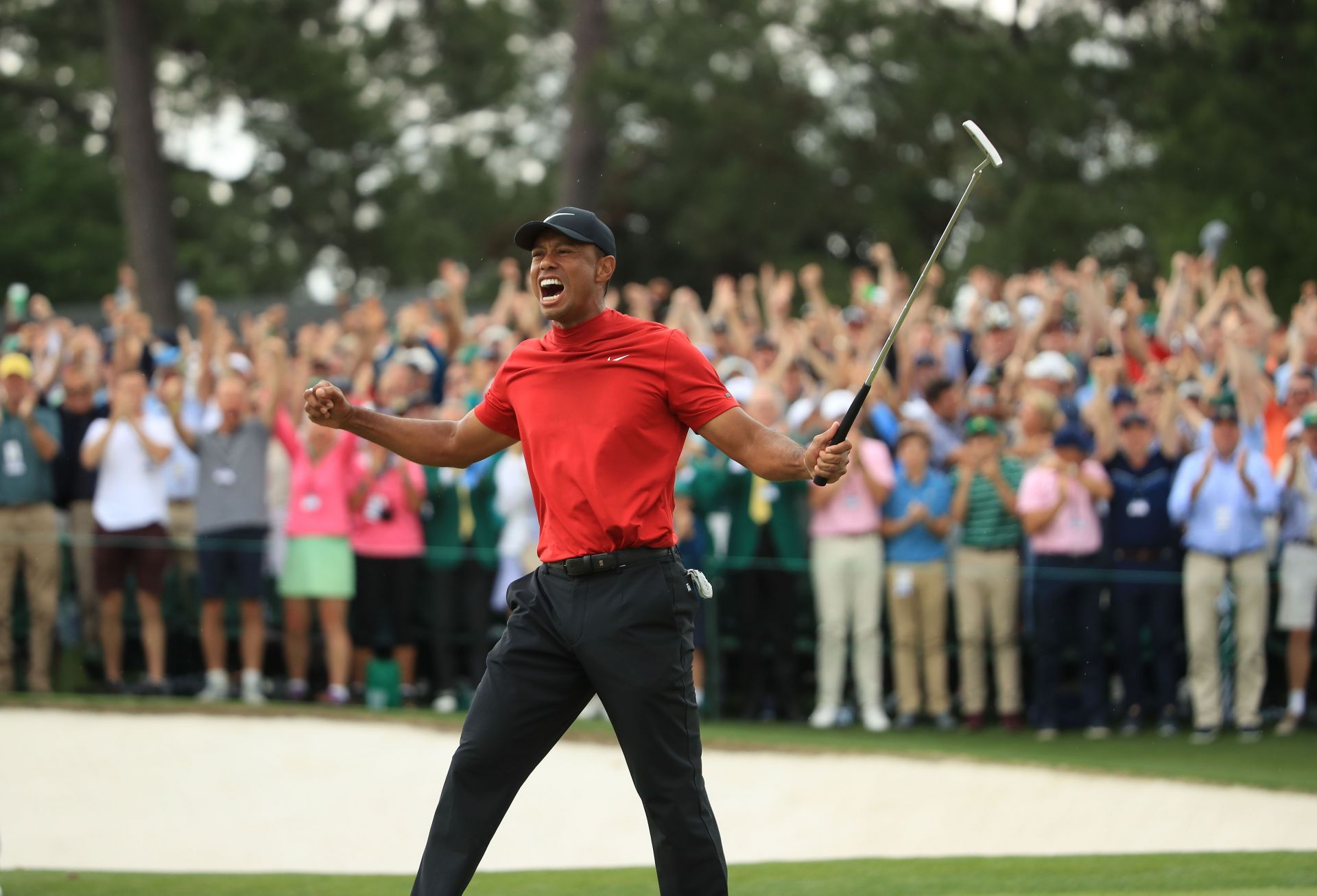 Tiger Woods celebrates after winning the 2019 Masters, his fifth title at Augusta National