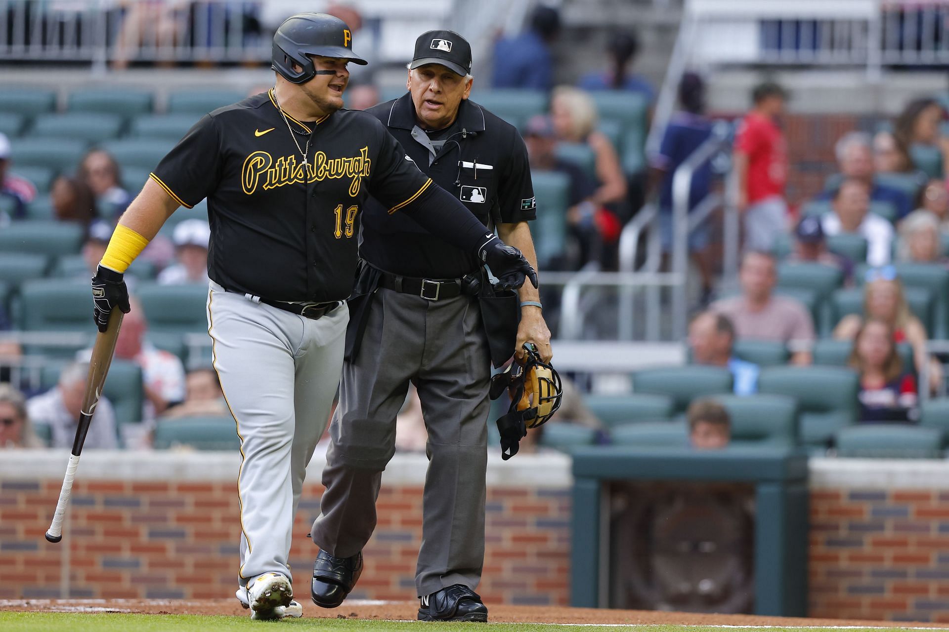 Daniel Vogelbach of the Pittsburgh Pirates argues a strikeout with home plate umpire Larry Vanover.