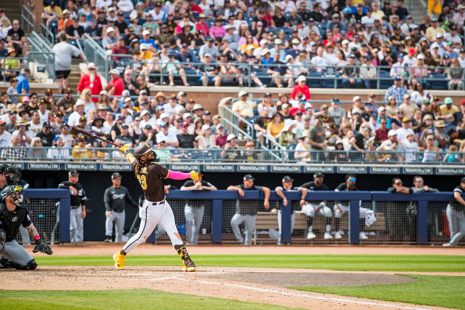 Fernando Tatis Jr. #23 of the San Diego Padres hits a two-run double during the fifth inning of the Spring Training Game against the Chicago White Sox at Peoria Stadium on March 11, 2023, in Peoria, Arizona.