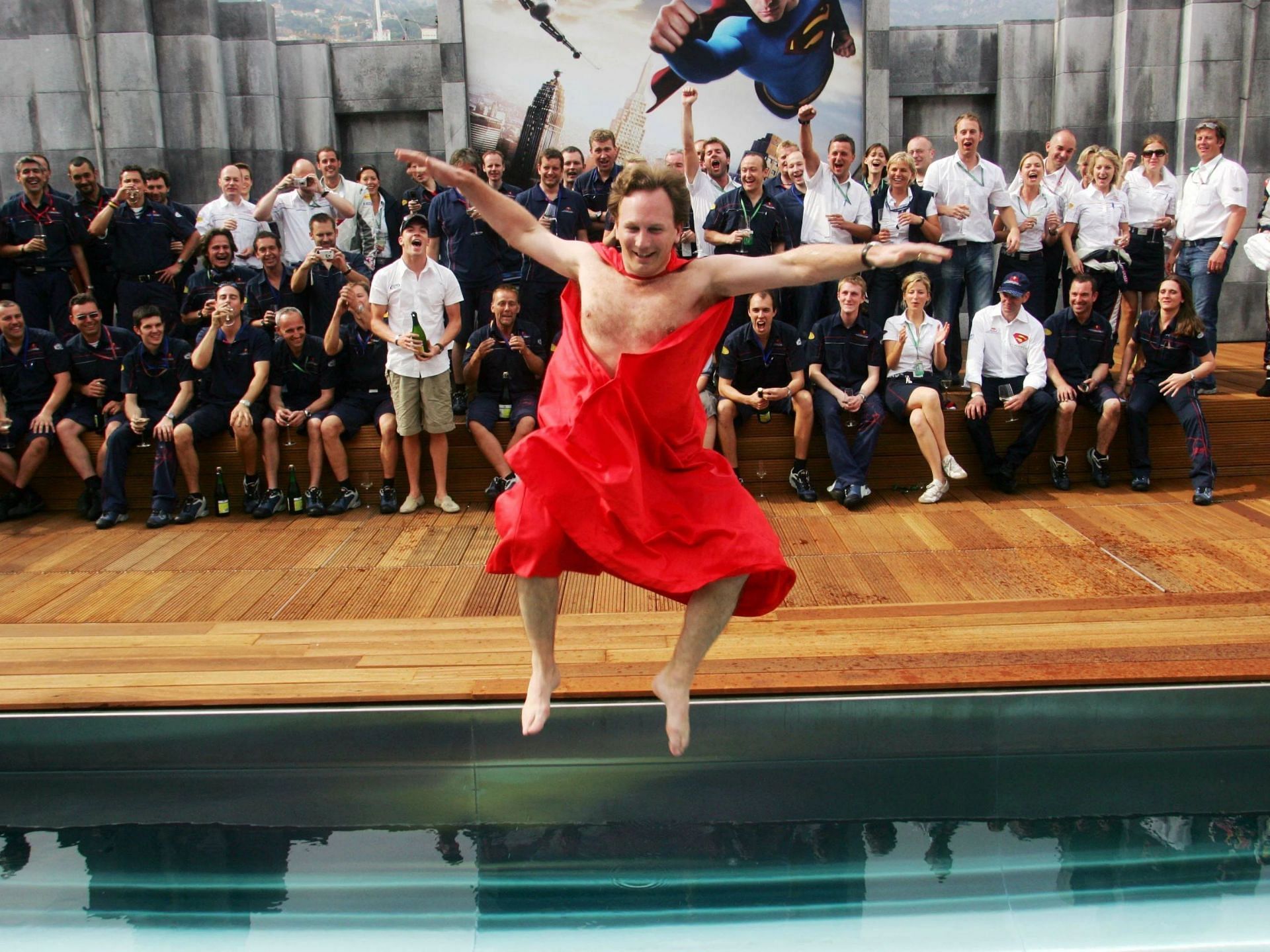 Half naked Christian Horner jumping in the swimming pool after the 2006 F1 Monaco Grand Prix (Image via Reddit / u/TVInBlackNWhite)