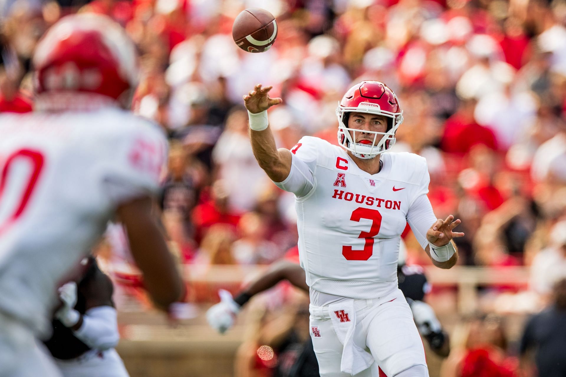 Quarterback Clayton Tune #3 of the Houston Cougars passes the ball during the game against the Texas Tech Red Raiders 