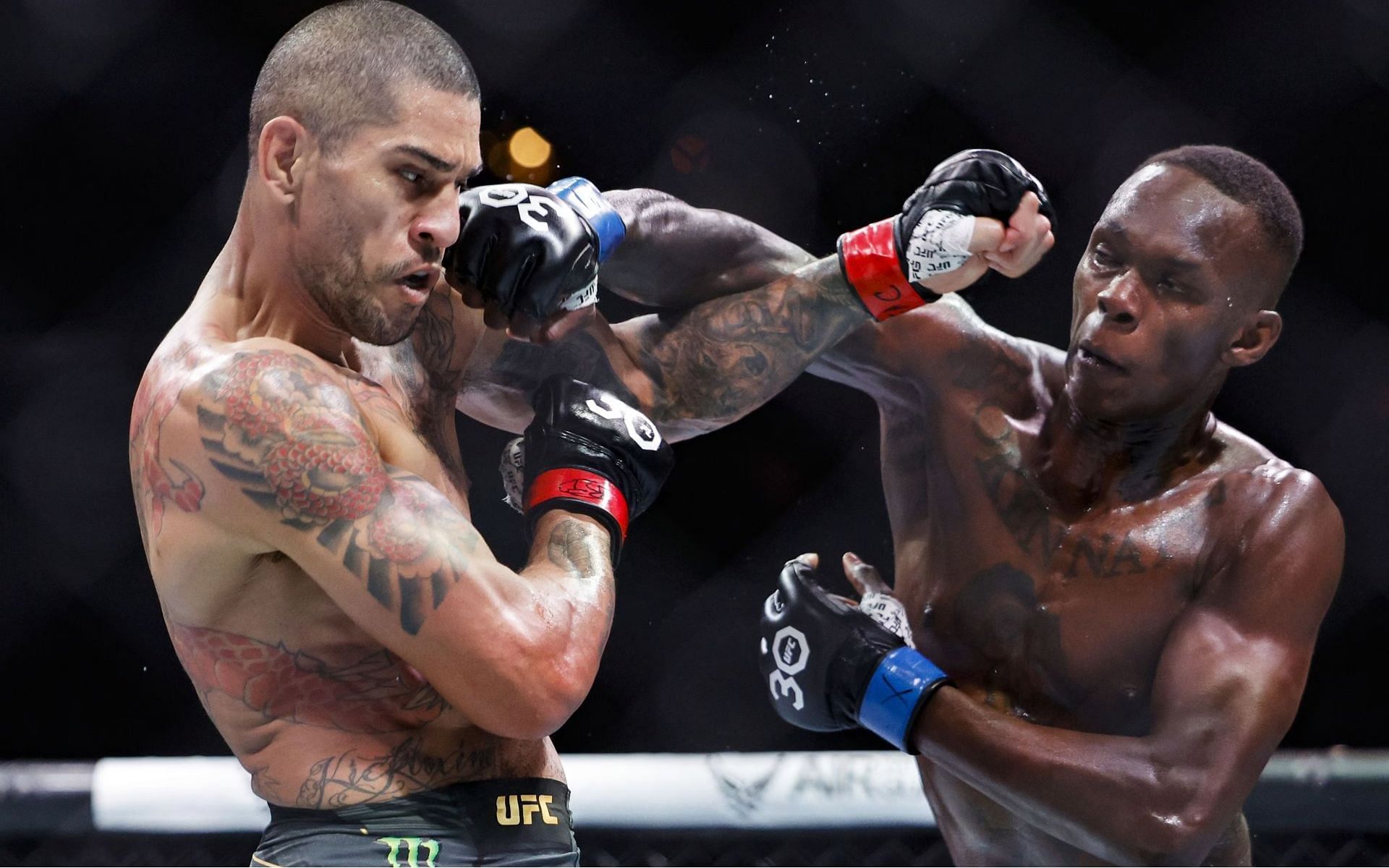 Israel Adesanya and Alex Pereira doing battle at UFC 287 [Image Credit: Getty]