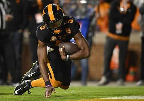 Hendon Hooker #5 of the Tennessee Volunteers scores a third quarter touchdown during the game against the Kentucky Wildcats