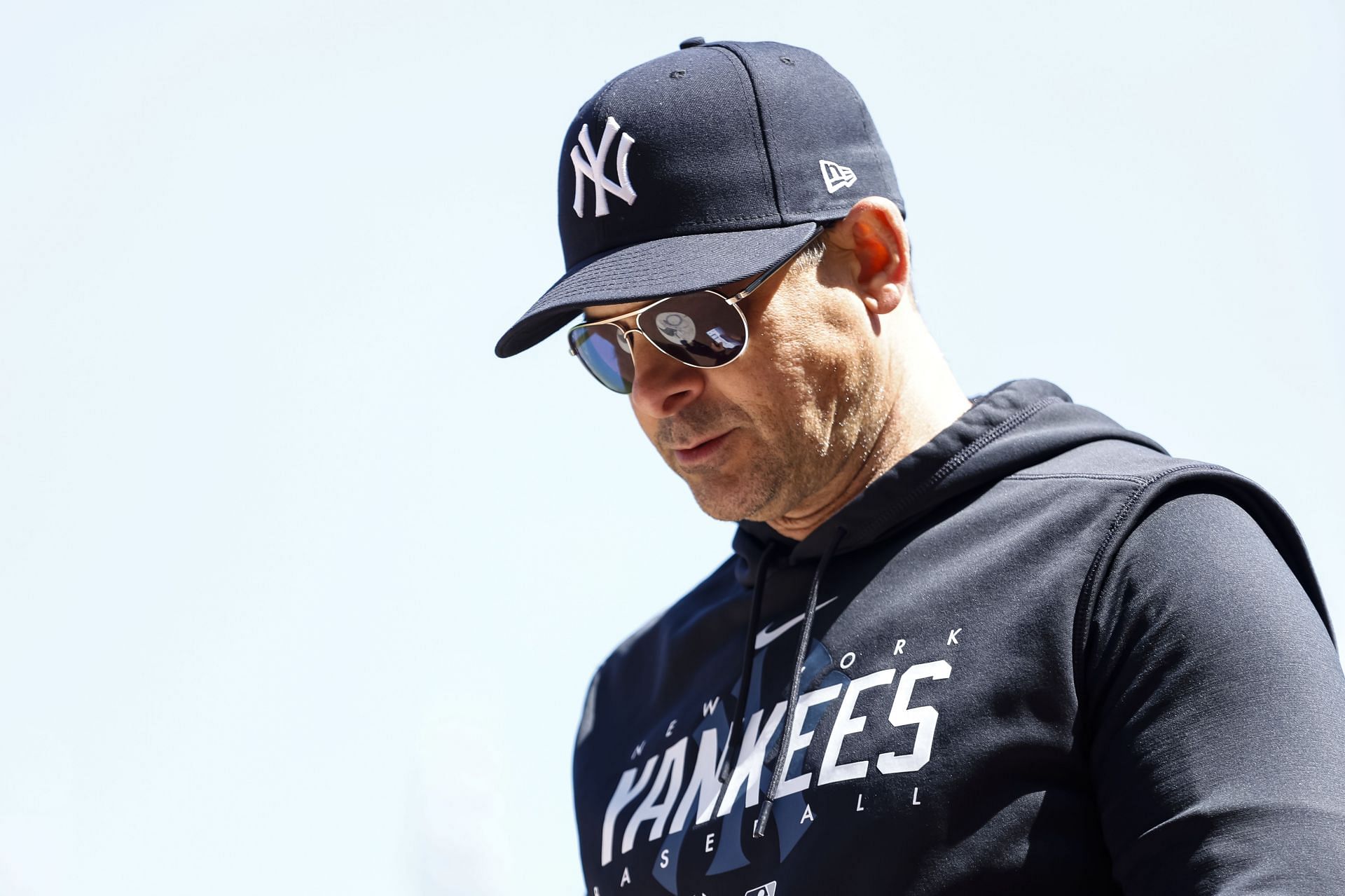 Aaron Boone #17 of the New York Yankees looks on against the Minnesota Twins in the ninth inning at Target Field on April 26, 2023 in Minneapolis, Minnesota. The Yankees defeated the Twins 12-6. (Photo by David Berding/Getty Images)