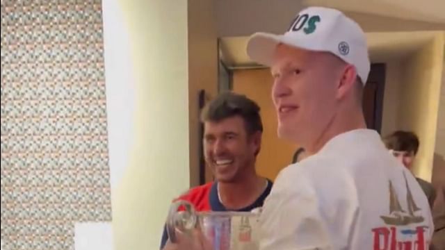 Brady Tkachuk chugs beer from Brooks Koepka