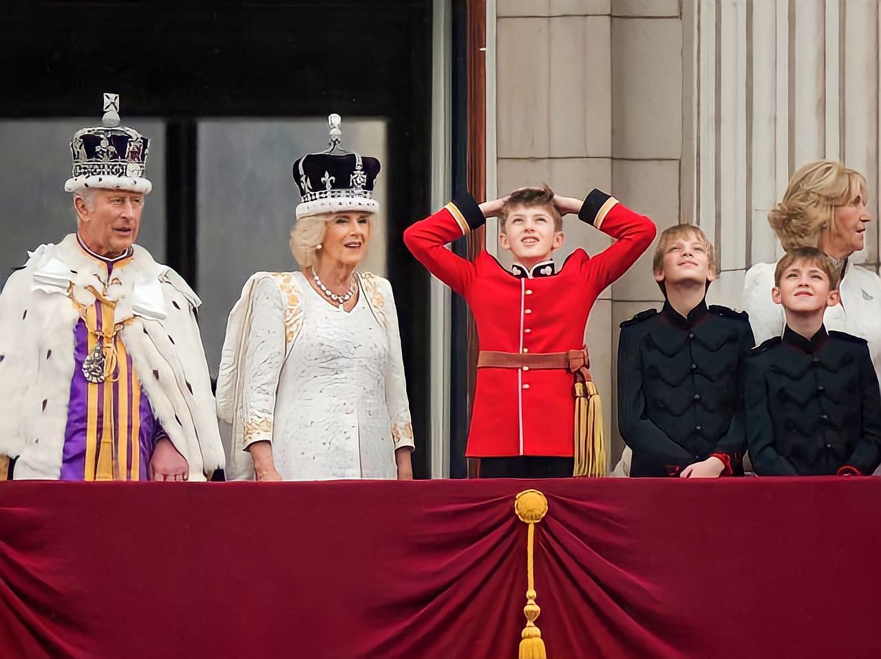 Arthur in a black outfit on the far right of the stage, his grandfather, King Charles, and Queen Camilla (Image via Getty)