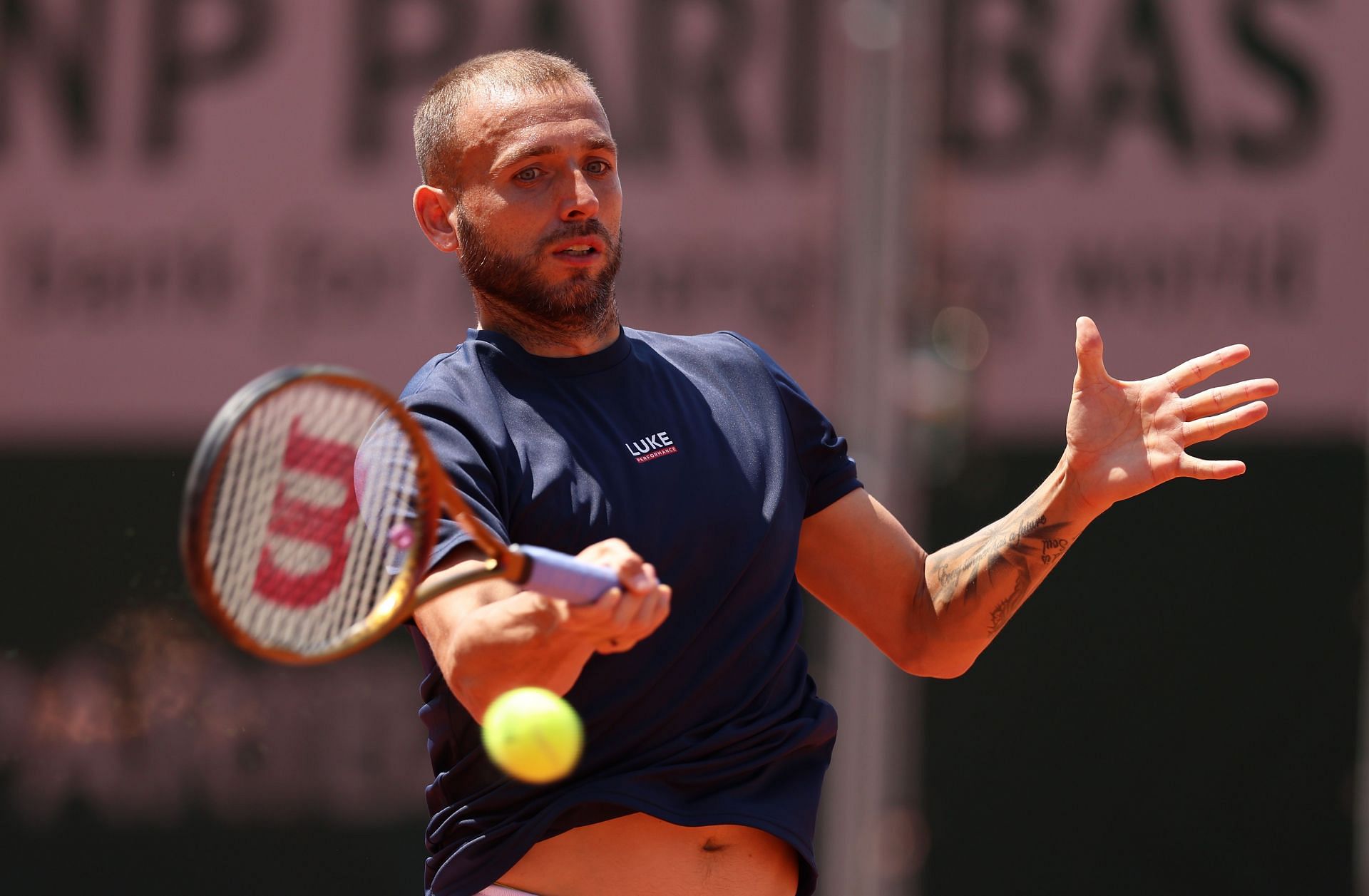 Dan Evans in action at the French Open