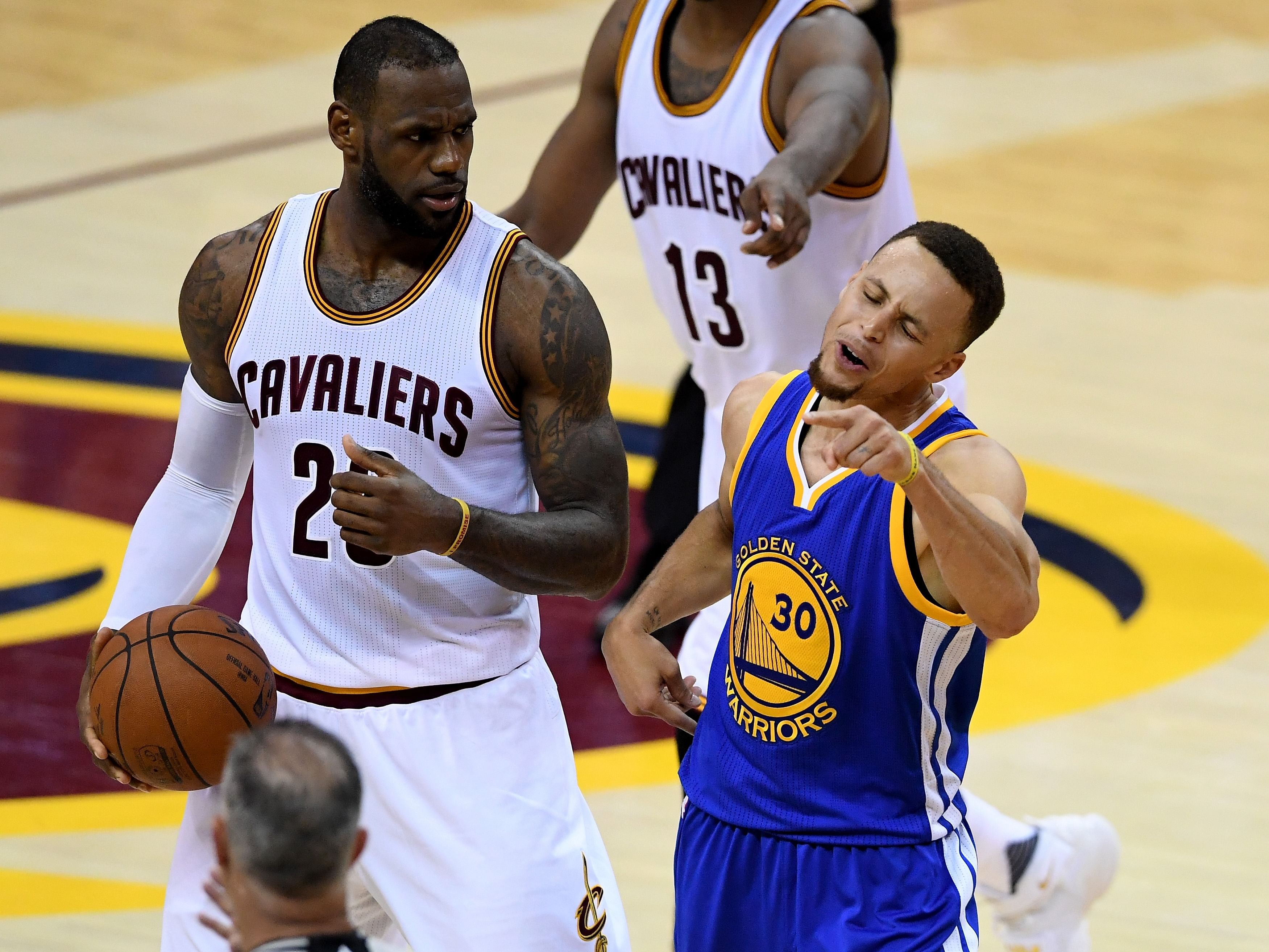 Golden State Warriors guard Stephen Curry (left) and then-Cleveland  Cavaliers forward LeBron James scramble for a loose ball during game 1 of  the 2016 NBA Finals. - WJCT Public Media