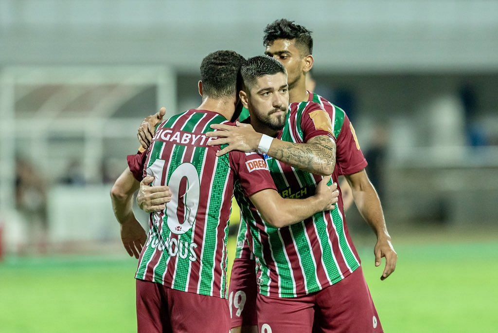 ATK Mohun Bagan players celebrating their opening goal against Hyderabad FC.